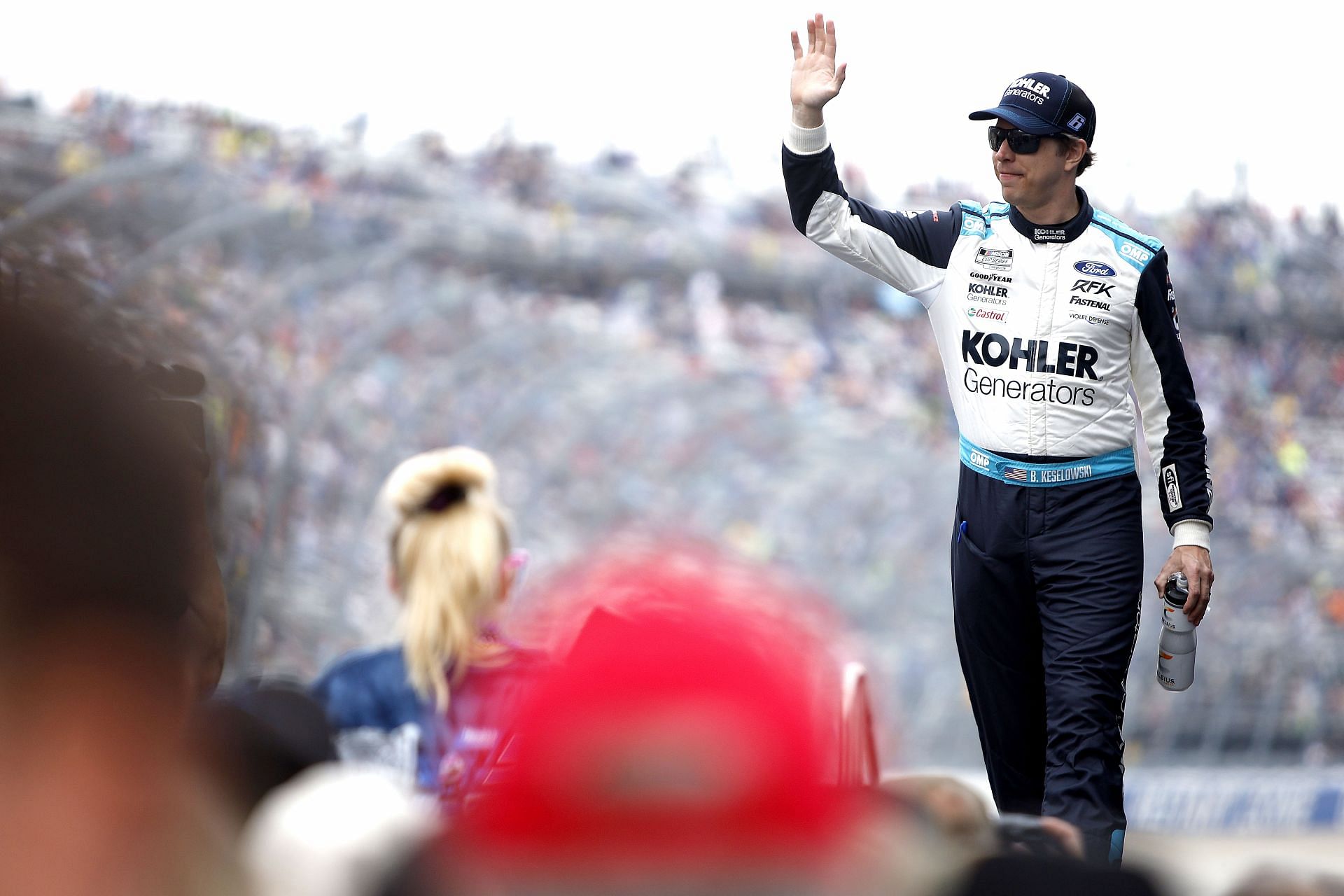 Brad Keslowski waves to fans during the driver intros prior to the NASCAR Cup Series DuraMAX Drydene 400 presented by RelaDyne at Dover Motor Speedway. (Photo by Sean Gardner/Getty Images)