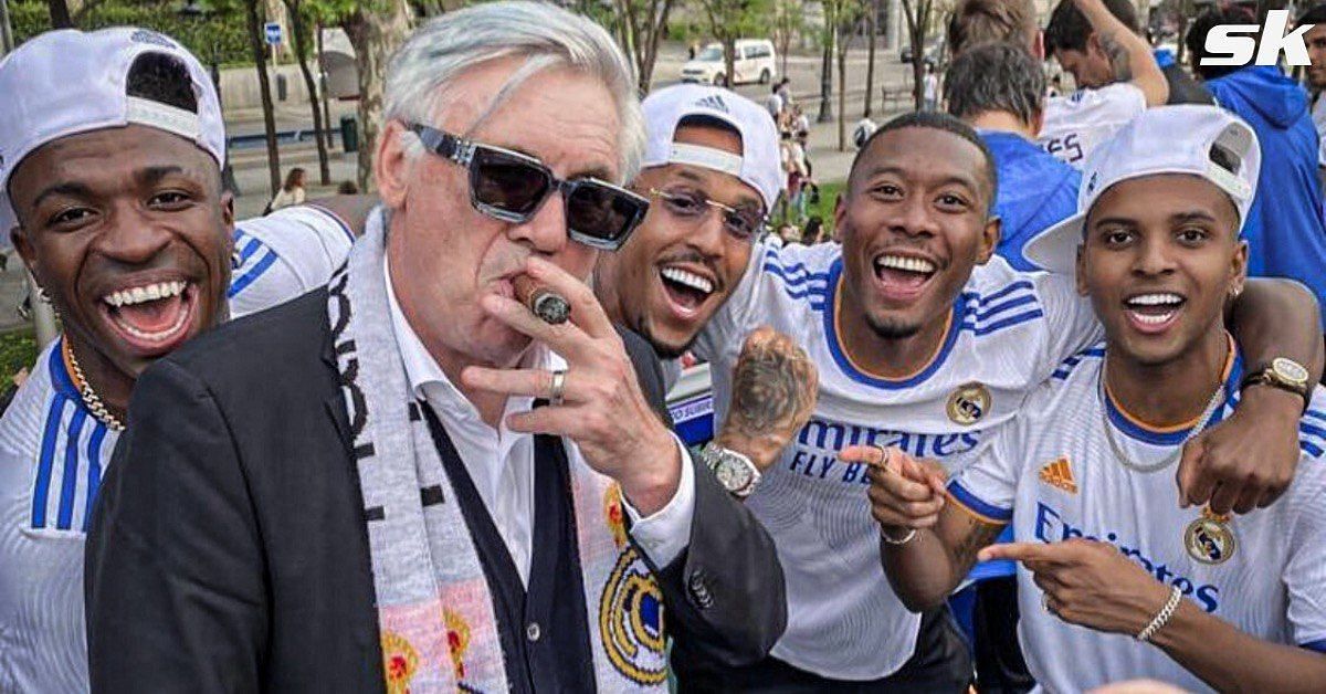 Los Blancos coach poses with cigar and shades