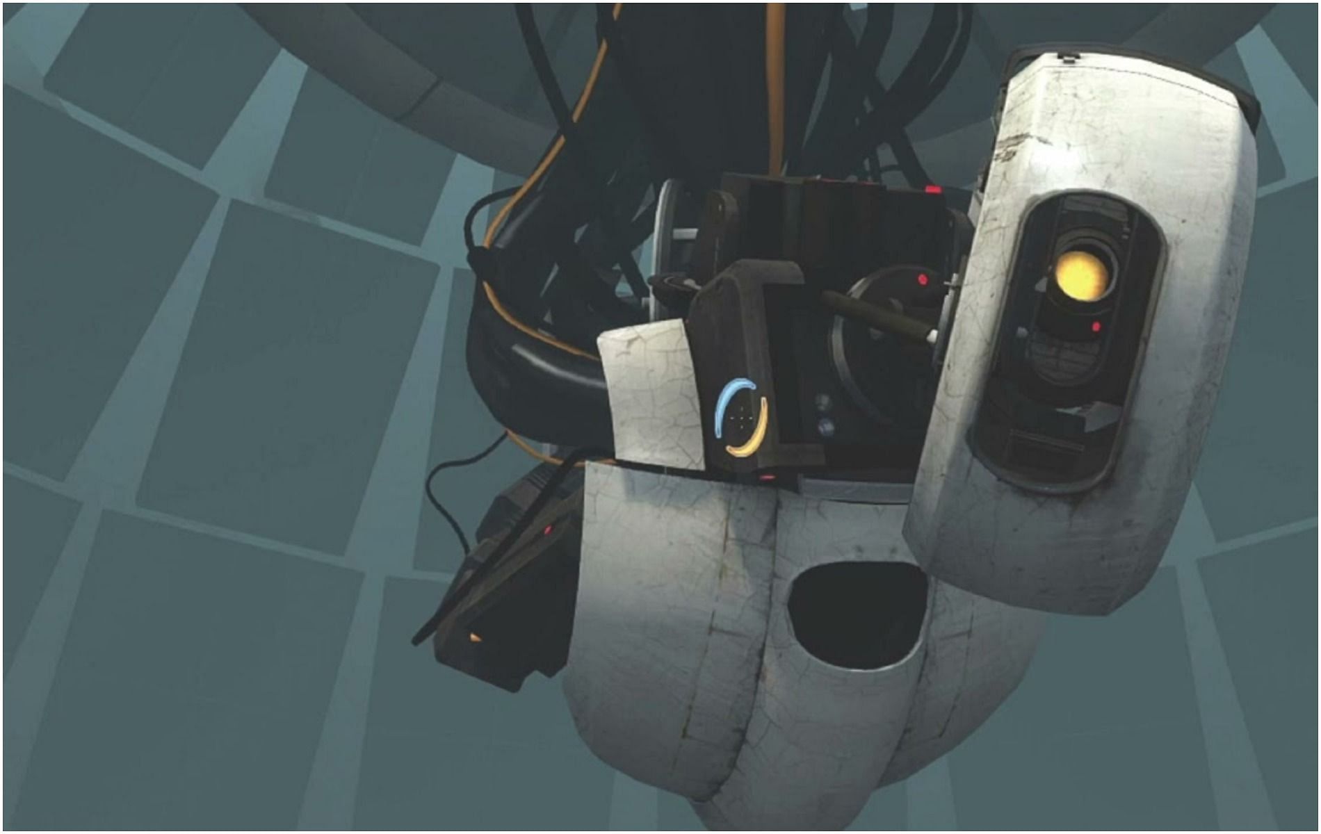 GLaDOS looks down from her perch in Portal (Image via Valve)