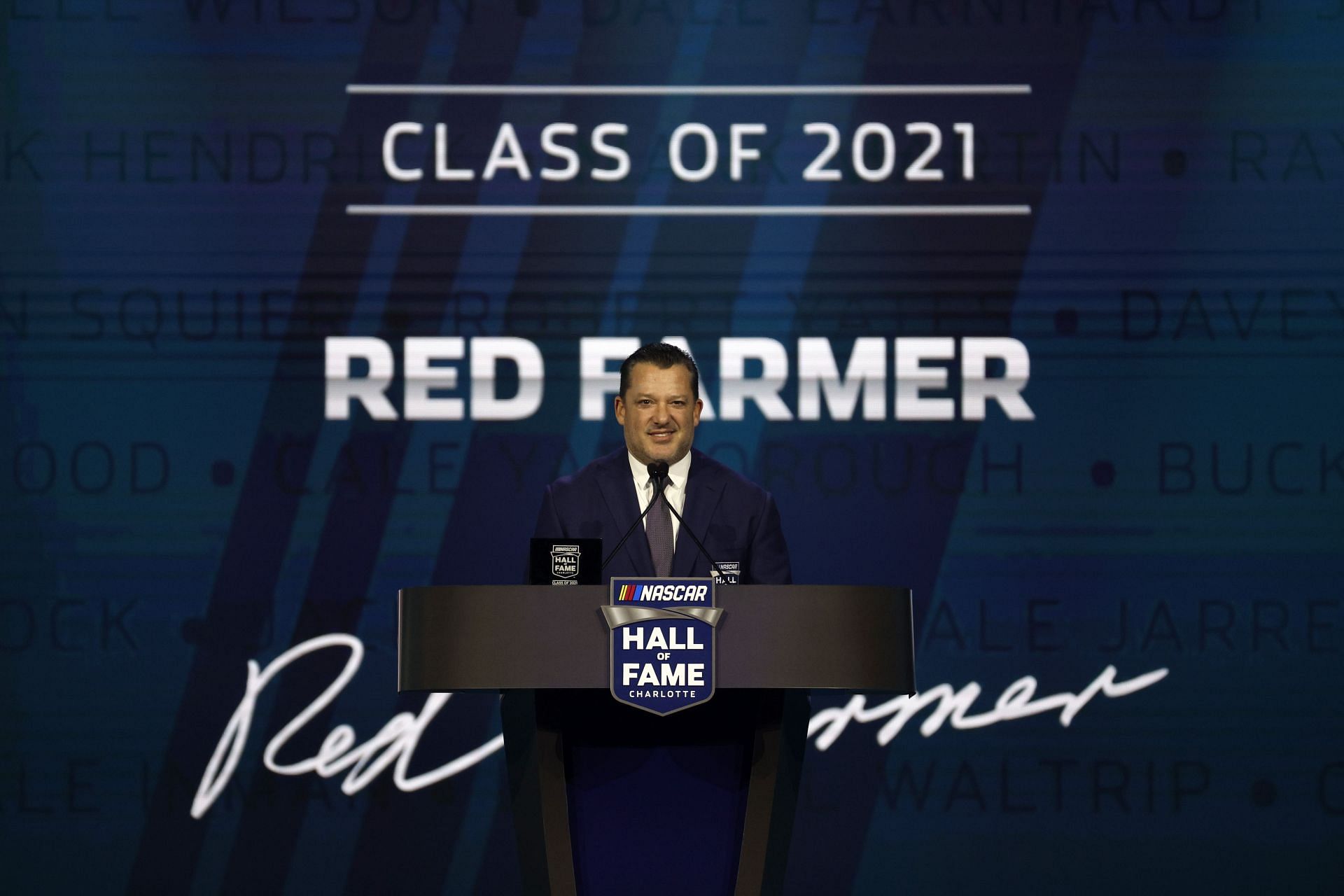 NASCAR Hall of Famer Tony Stewart speaks during the 2021 Hall of Fame Induction Ceremony (Photo by Chris Graythen/Getty Images)