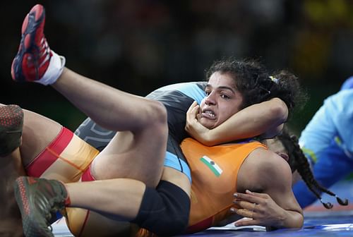 Sakshi Malik (in orange) in action at the 2018 Commonwealth Games (Image courtesy: Getty Images)