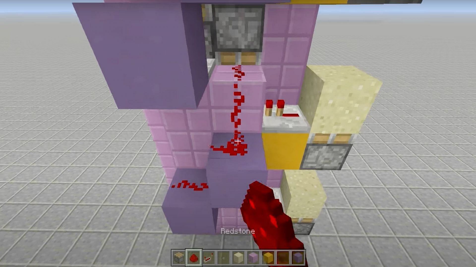 Players need to complete the circuit with 2 blocks and some redstone dust (Image via Fed X Gaming/YouTube)