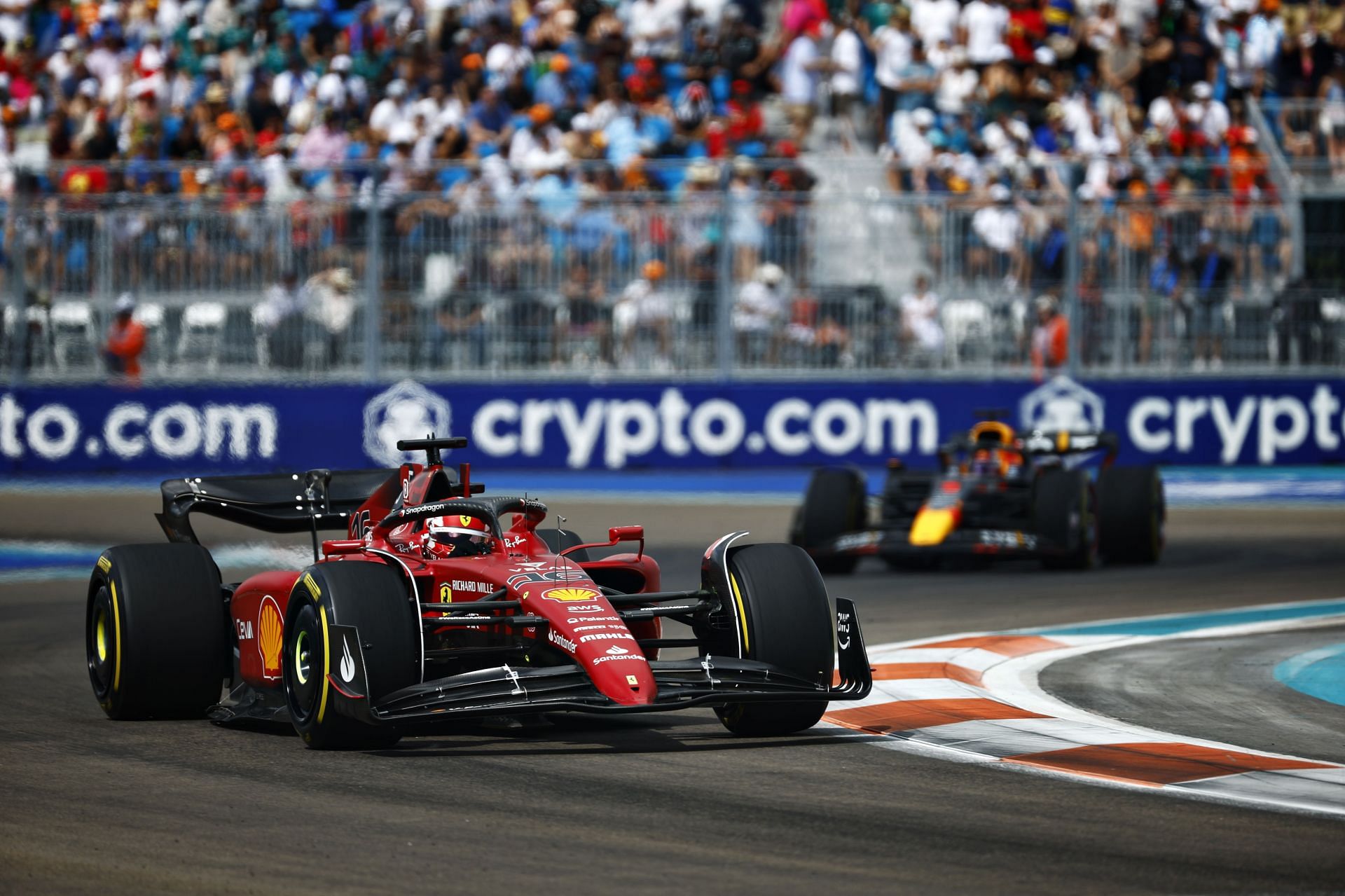 Charles Leclerc (16) Scuderia Ferrari F1-75, leads Max Verstappen (1) Red Bull Racing RB18, 2022 Miami GP