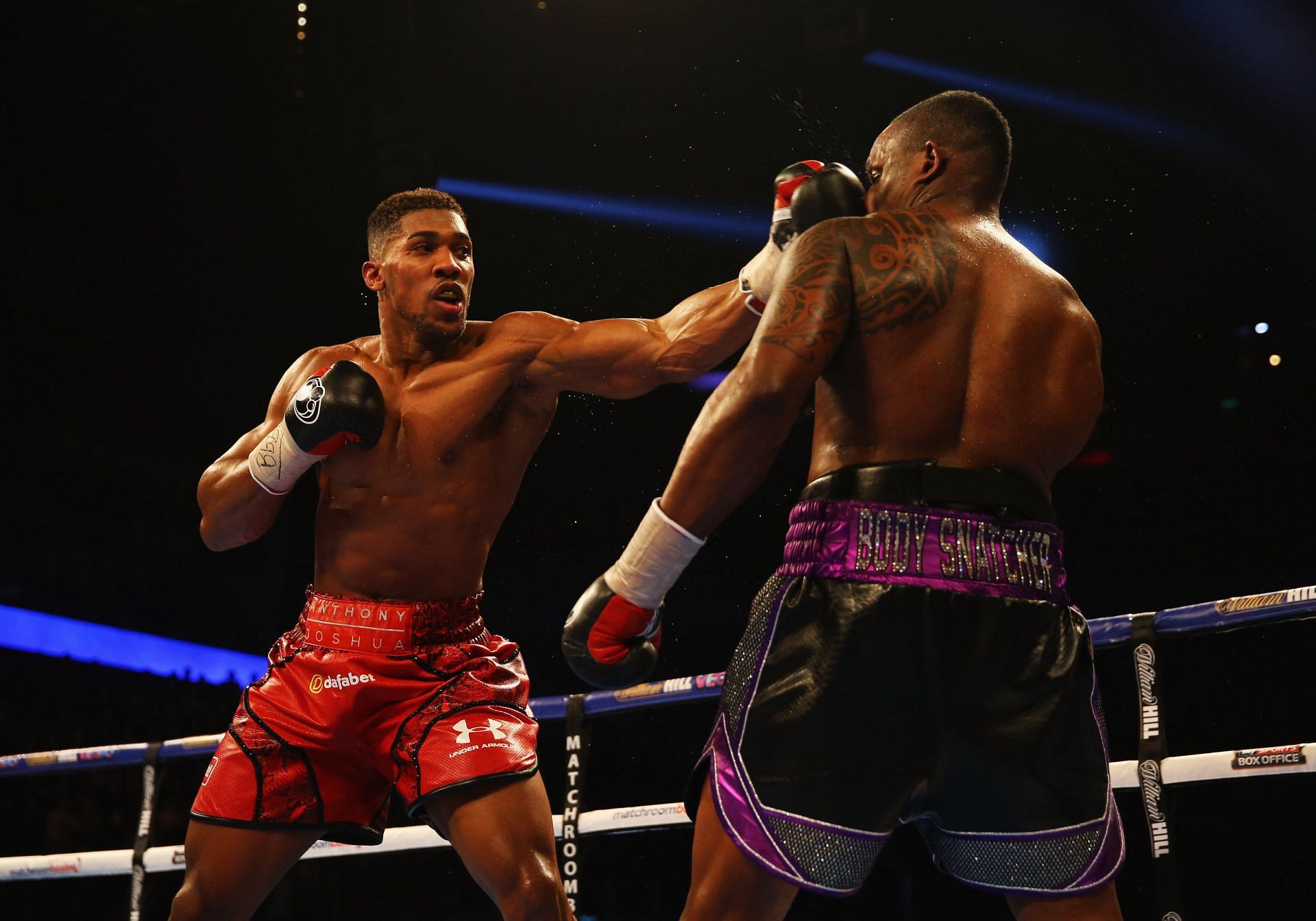 Anthony Joshua (left) and Dillian Whyte (right) during the British and Commonwealth Heavyweight Title contest at The O2 Arena on December 12, 2015, in London, England. (Photo by Richard Heathcote/Getty Images)