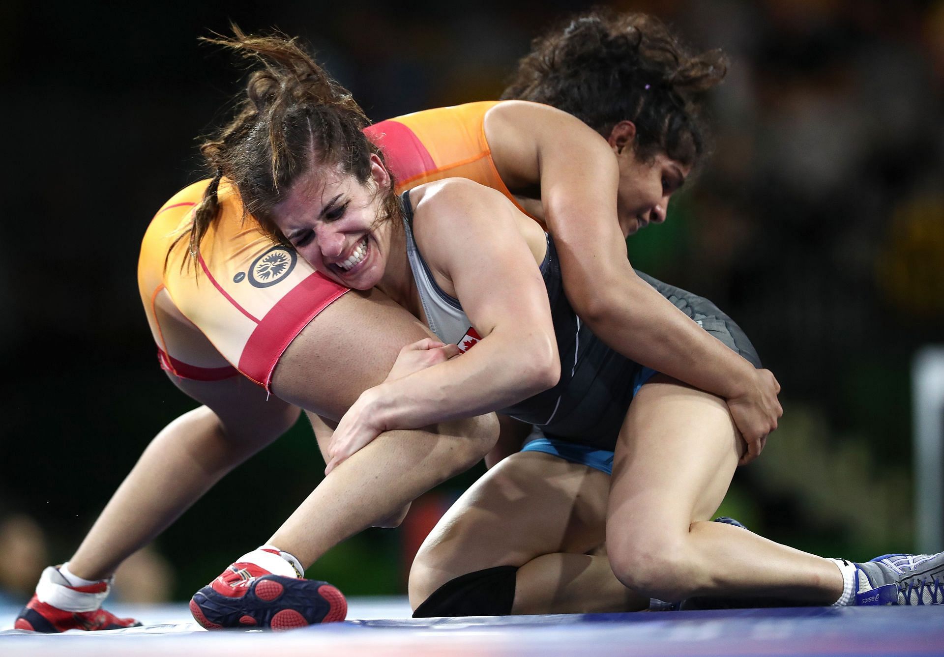 Sakshi Malik (in orange) in action at the 2018 Commonwealth Games (Image courtesy: Getty Images)