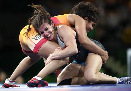 Sakshi Malik (in orange) in action at the 2018 Commonwealth Games (Image courtesy: Getty Images)