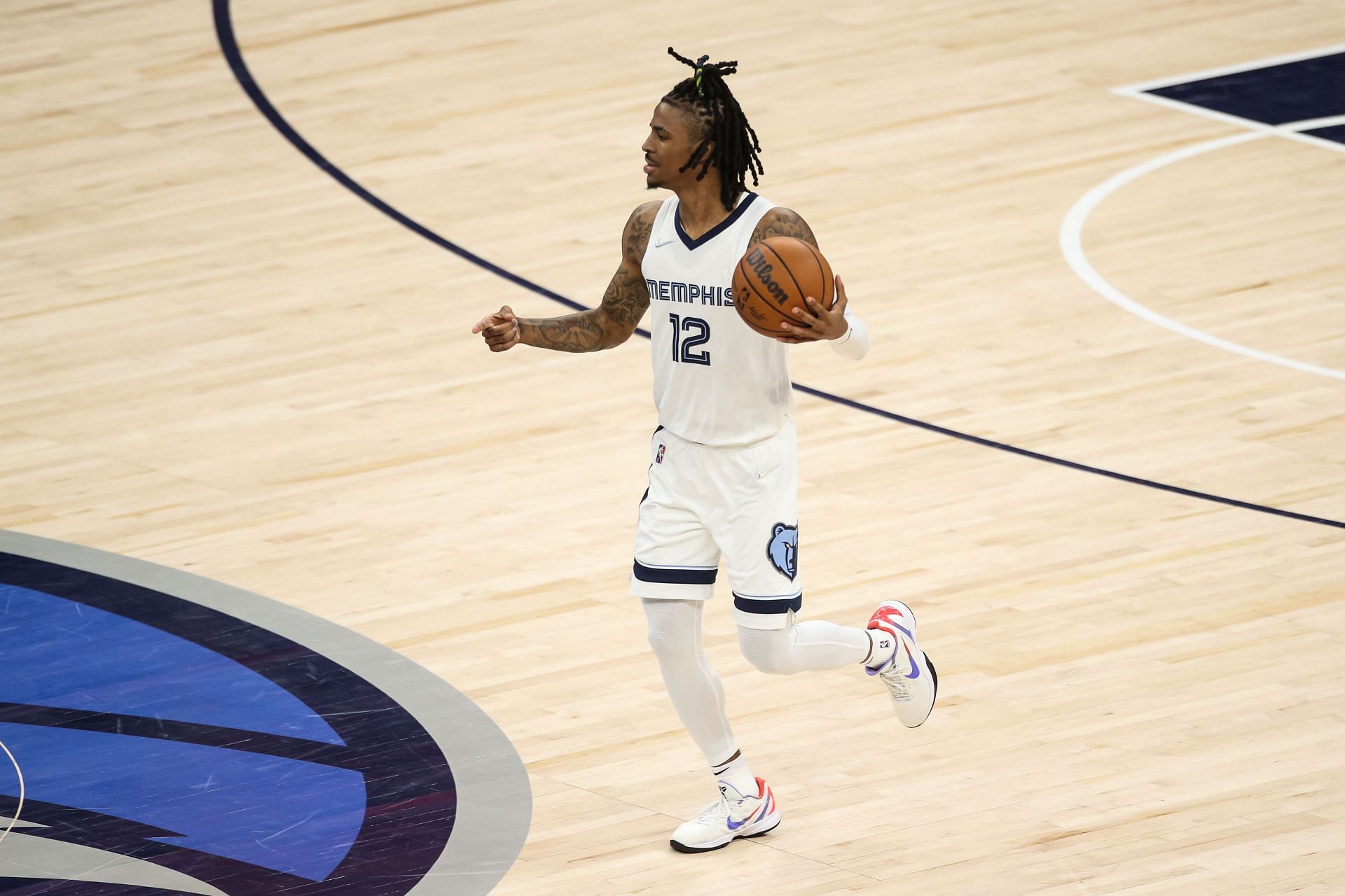 Ja Morant of the Memphis Grizzlies dribbles the ball against the Minnesota Timberwolves in the third quarter of the game during Game 6.
