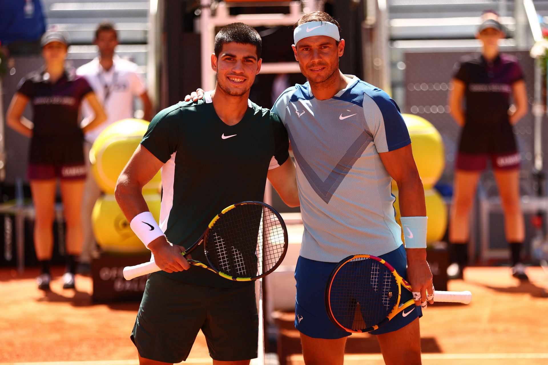 Carlos Alcaraz (L) and Rafael Nadal ahead of their match at the 2022 Madrid Open