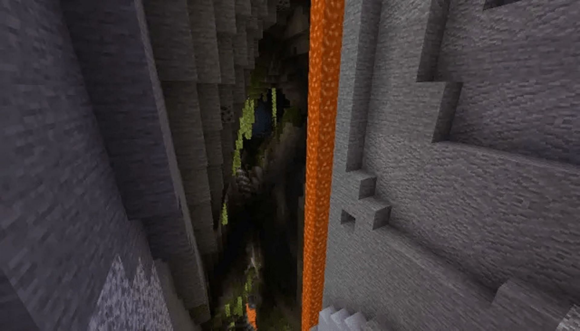 A lush cave in a lava-flowing ravine? Why not? (Image via Mojang)