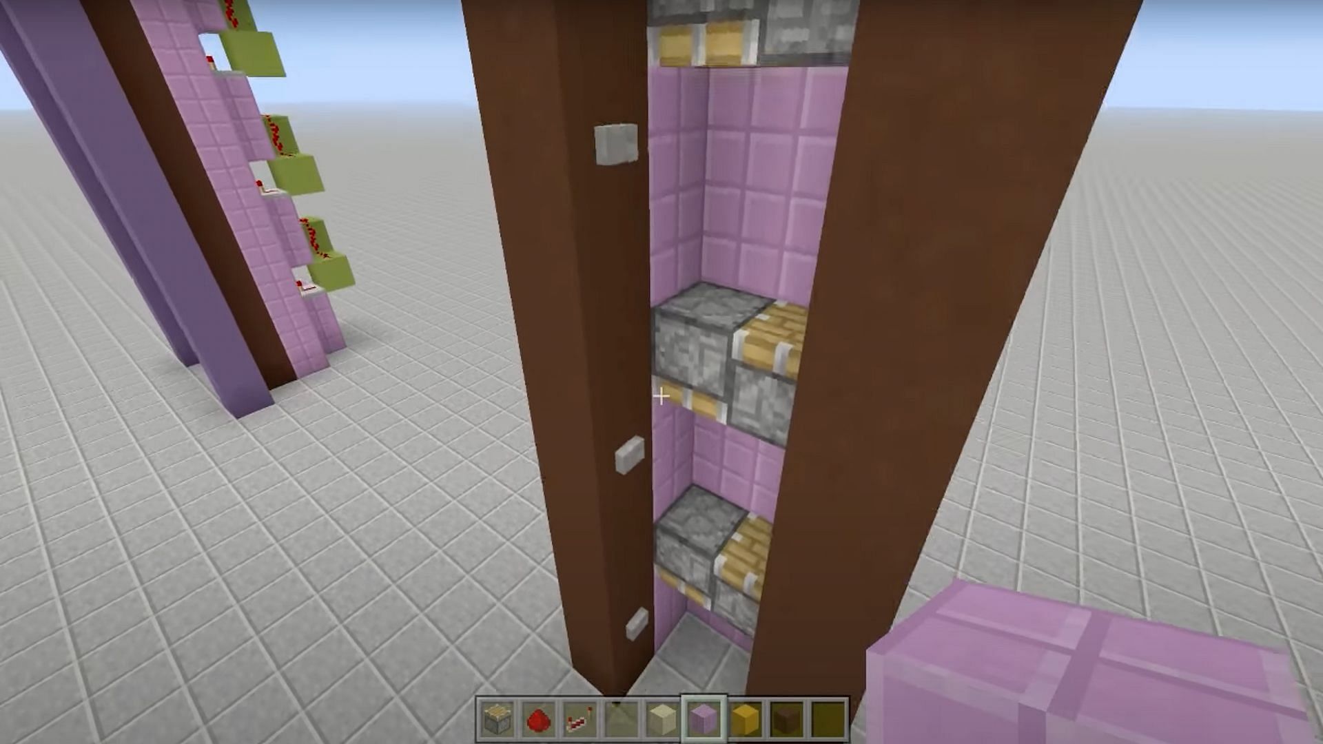 Minecraft players should place buttons 1 block under each piston on the left side (Image via Fed X Gaming/YouTube)