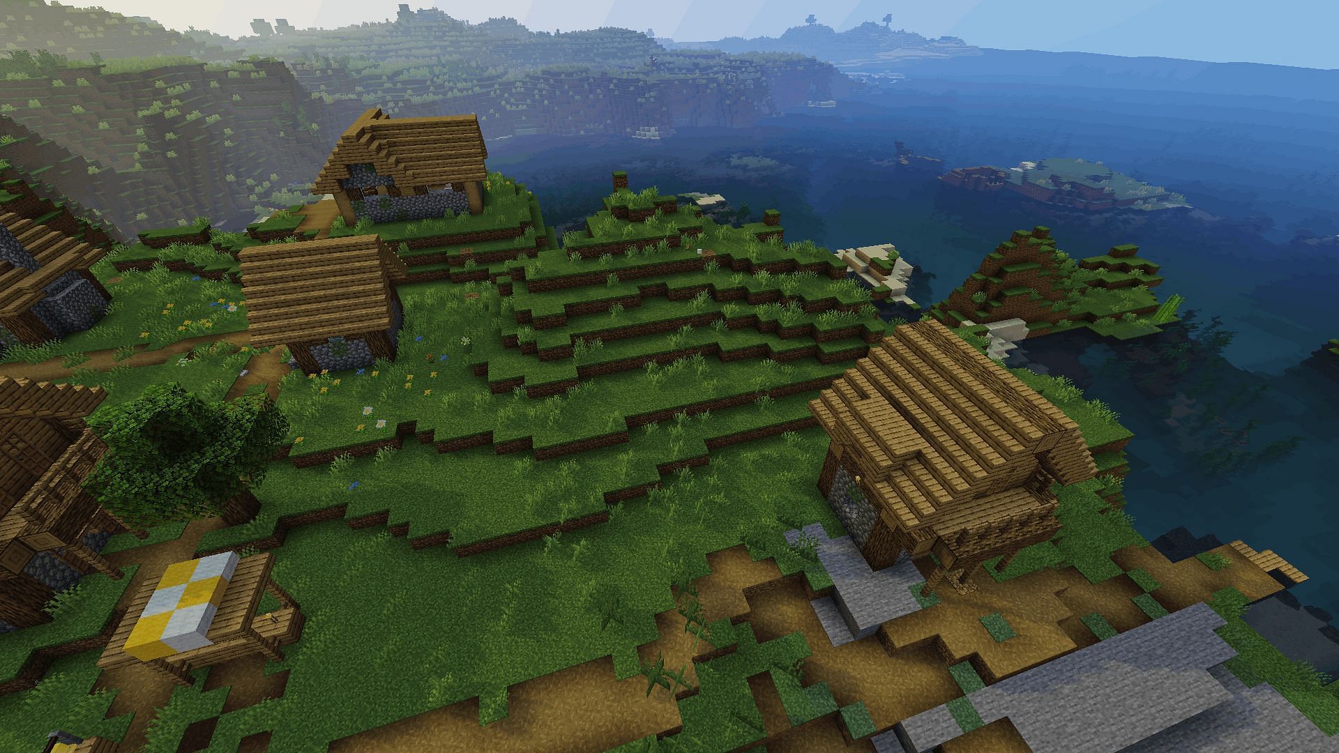 A coastal village with the Lagless shader (Image via Minecraft)