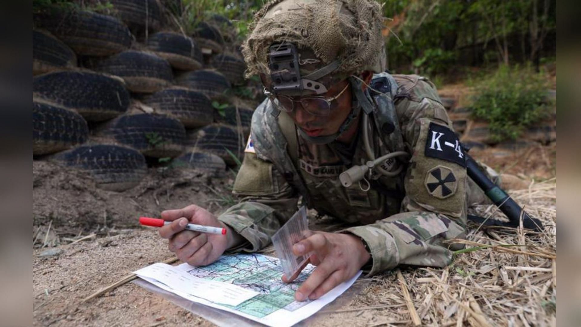 Army Pfc. Kang Young Hyun aka, DAY6&#039;s Young K, during Best Warrior land navigation challenge (Image via Stars and Stripes)
