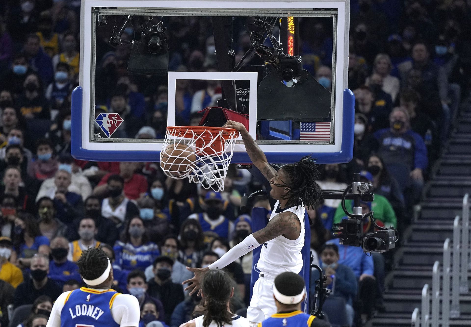 Ja Morant scores off a dunk against the Golden State Warriors