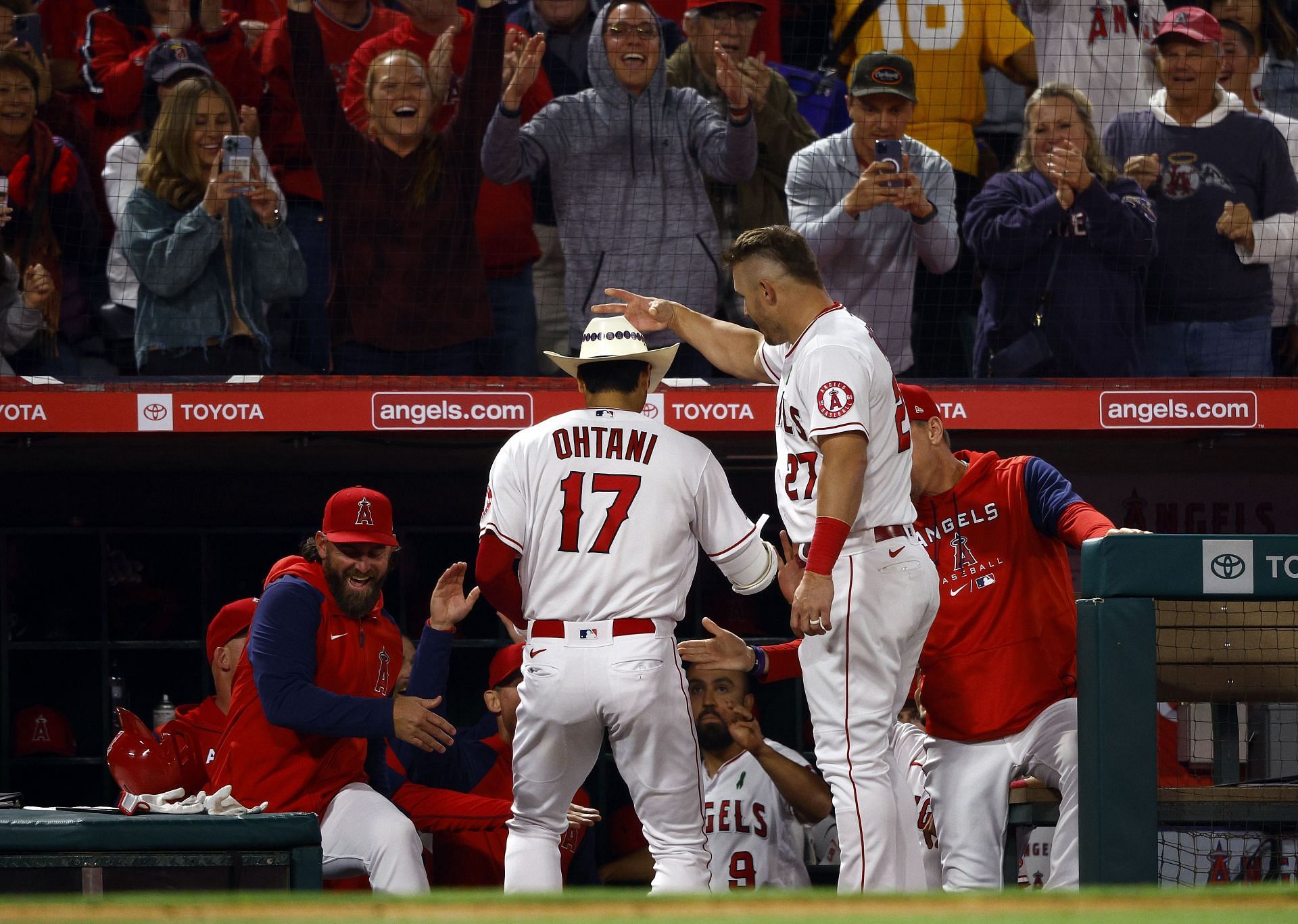 Los Angeles Angels teammates Mike Trout and Shohei Ohtani congratulate each other after a homer by Ohtani over the Tampa Bay Rays last week.