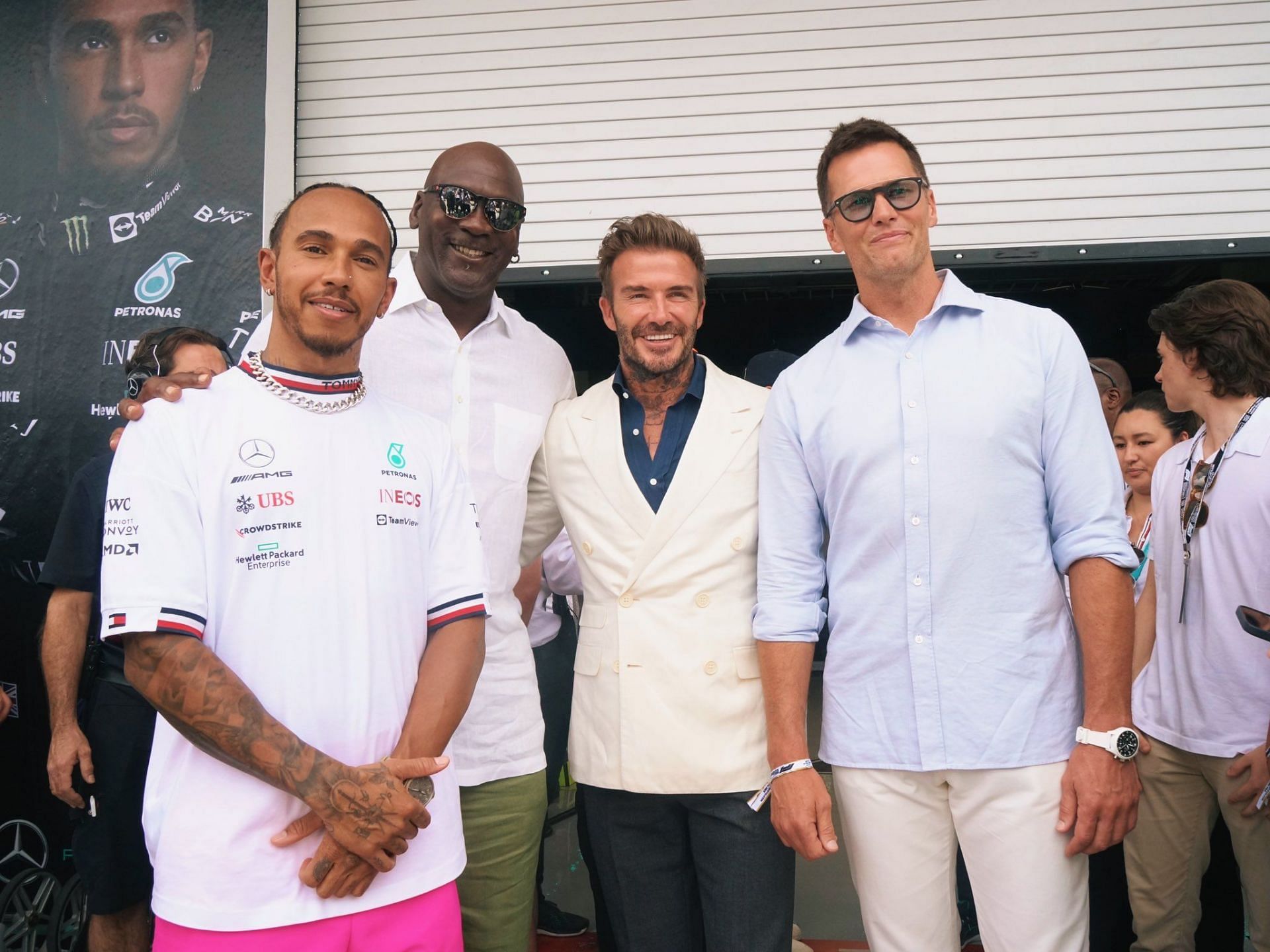 Hamilton, Jordan, Beckham and Brady posing for a photo via Tom Brady Twitter.