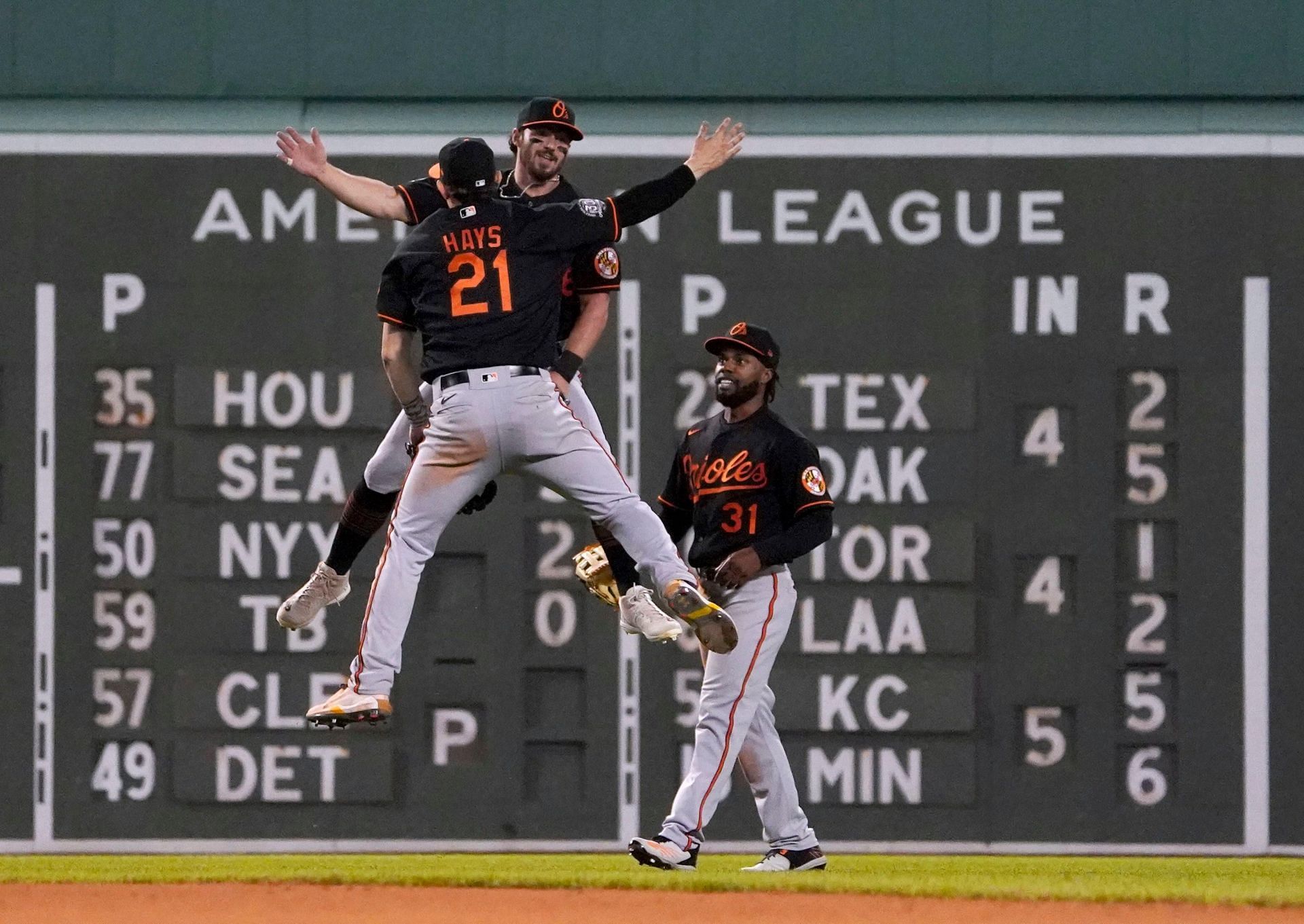 The Baltimore Orioles celebrate after coming back from down six runs to defeat the Boston Red Sox.
