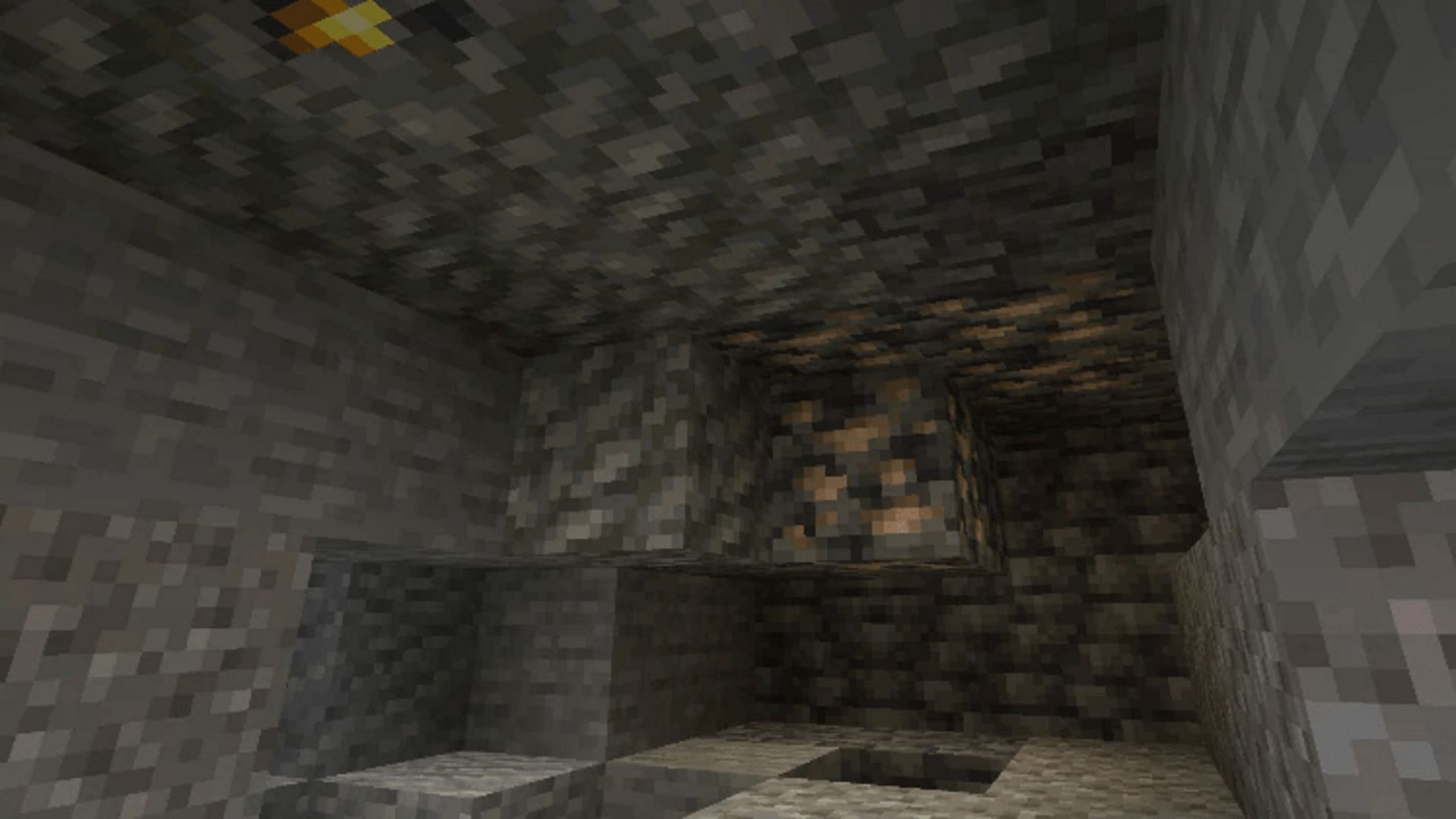 Deepslate iron hidden among tuff blocks (Image via Mojang)