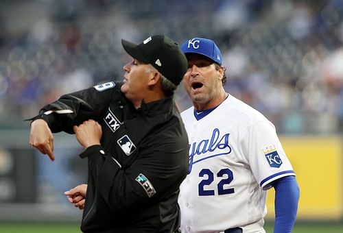 Manager Torey Lovullo #17 of the Arizona Diamondbacks argues with umpires Dan Bellino