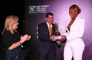 Serena Williams is presented with the WTA year-end World No. 1 trophy at the 2014 WTA Finals