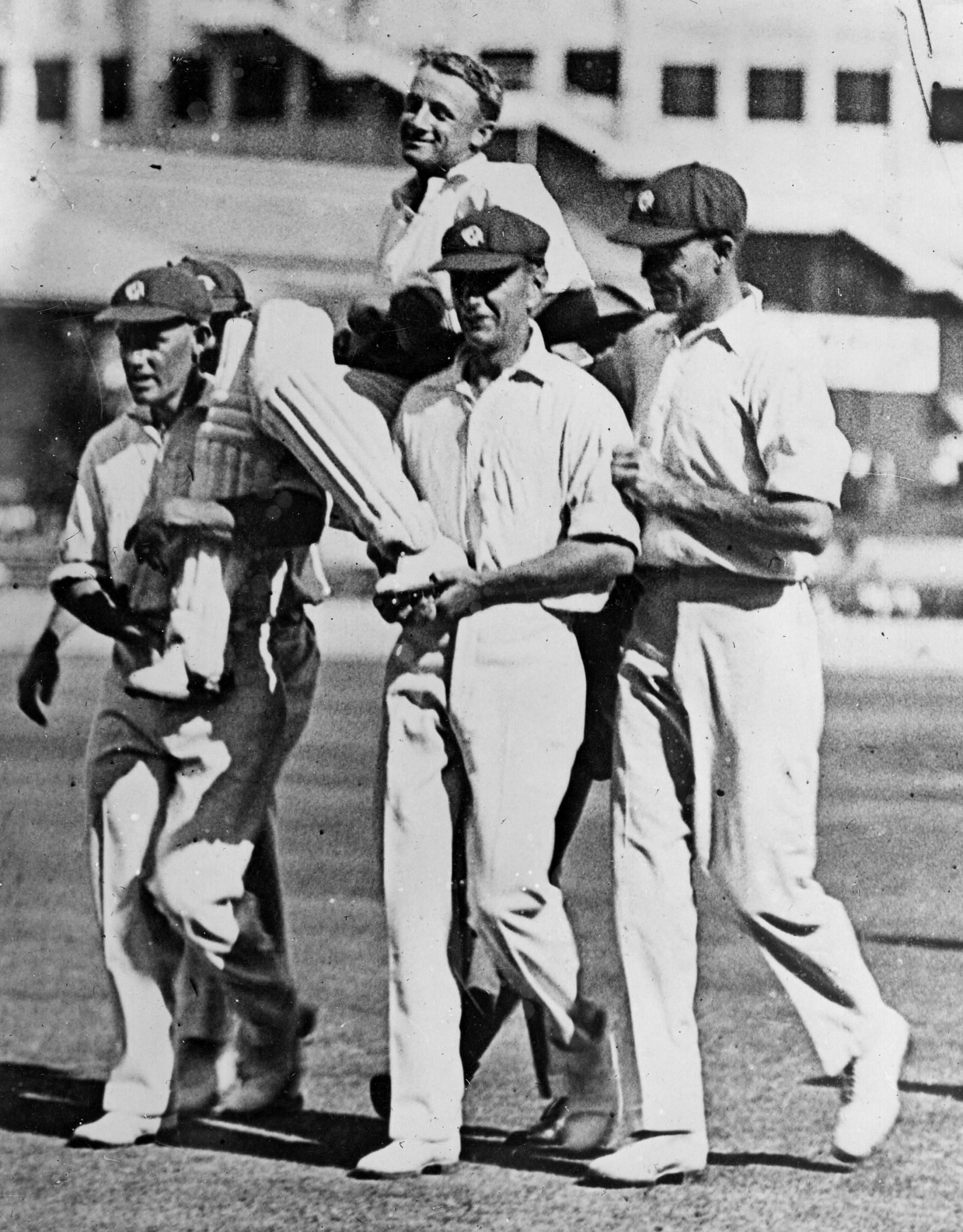 Record high! Bradman carried by jubilant New South Wales teammates at the Sydney Cricket Ground on January 6, 1930, after he scored his record-shattering unbeaten 452 against Queensland, surpassing Victorian Bill Ponsford&rsquo;s 437
