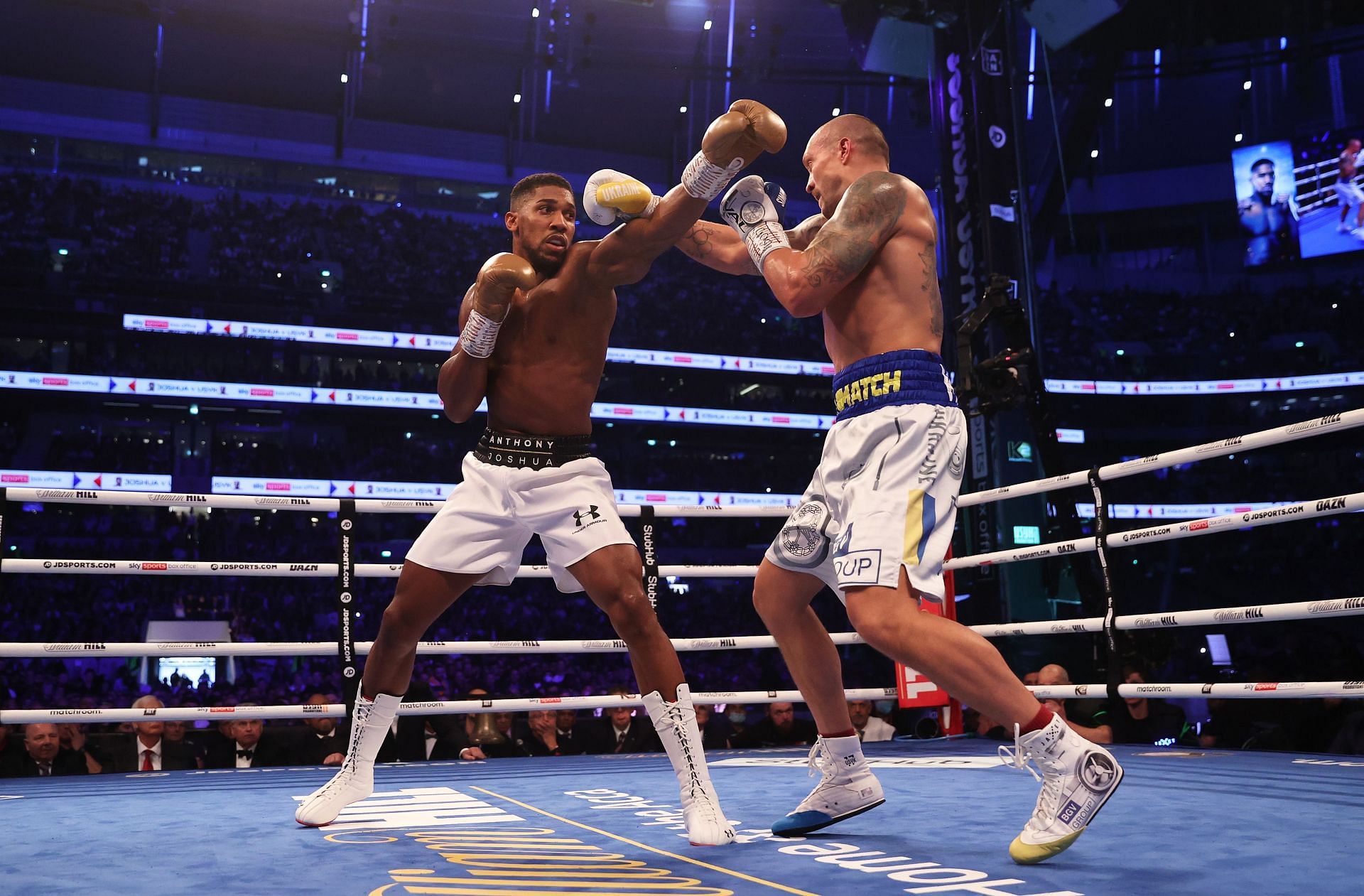 Anthony Joshua and Usyk doing battle in their September clash