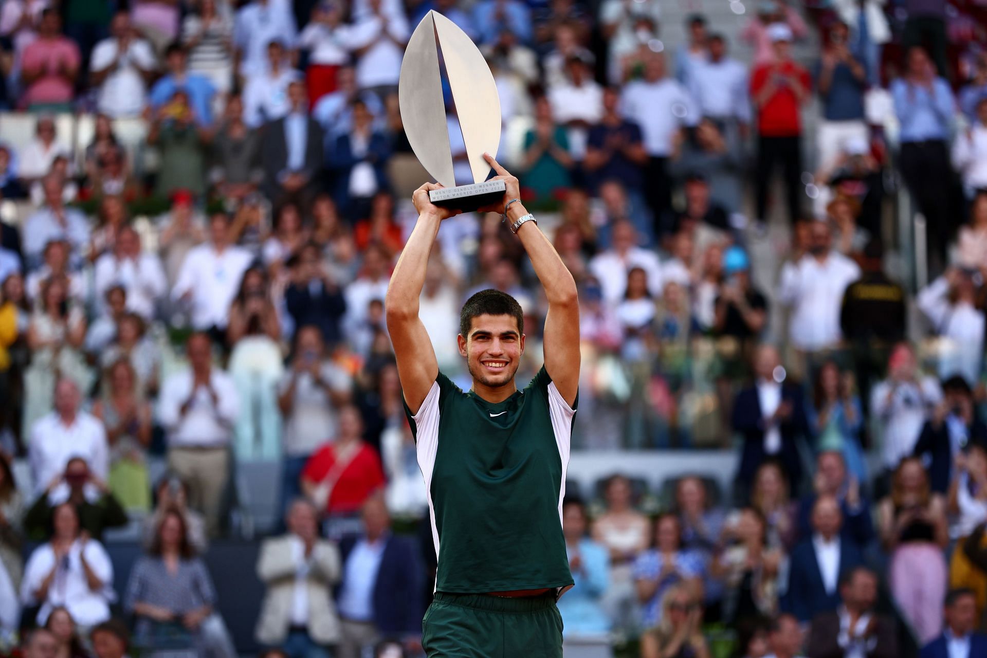 Carlos Alcaraz with the Madrid Open Trophy - photo by Clive Brunskill/Getty Images