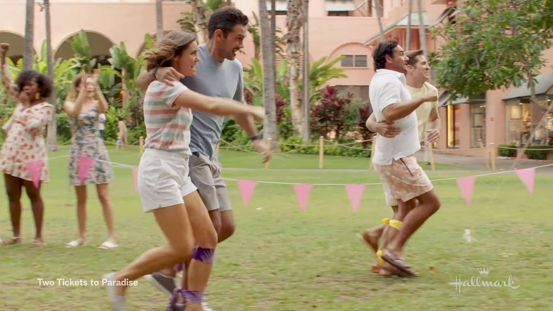 Hannah and Josh participate in a fun event in Hawaii (Image via Hallmark)