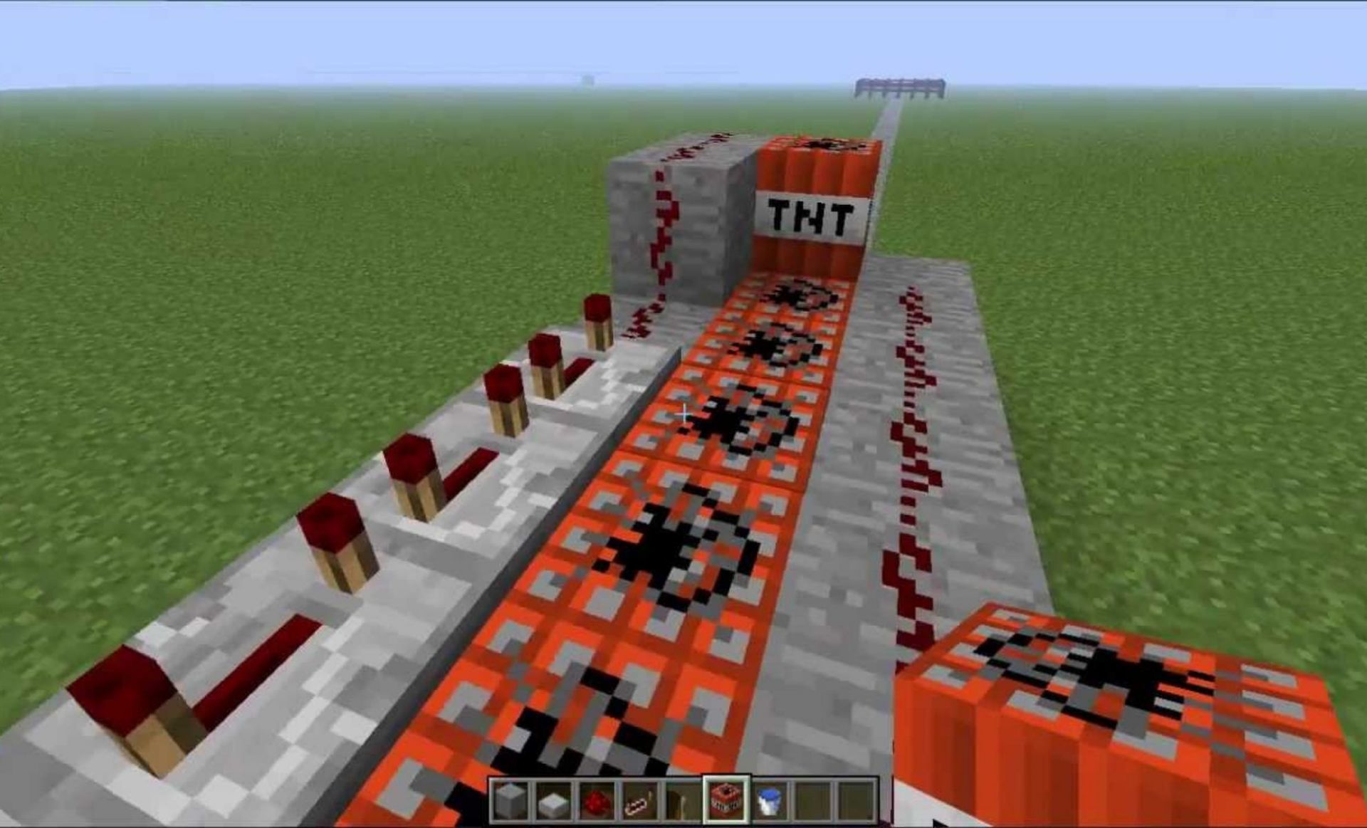 A basic TNT cannon (Image via MC Naveed on YouTube)