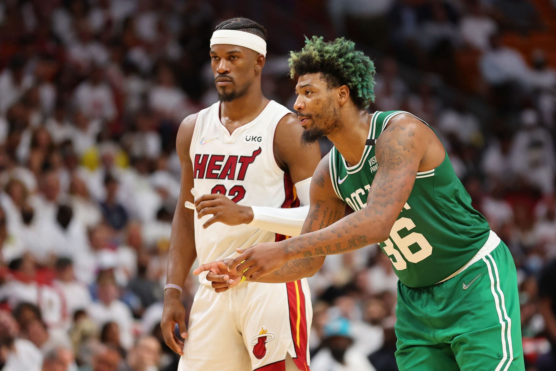 Jimmy Butler of the Miami Heat and Marcus Smart of the Boston Celtics.