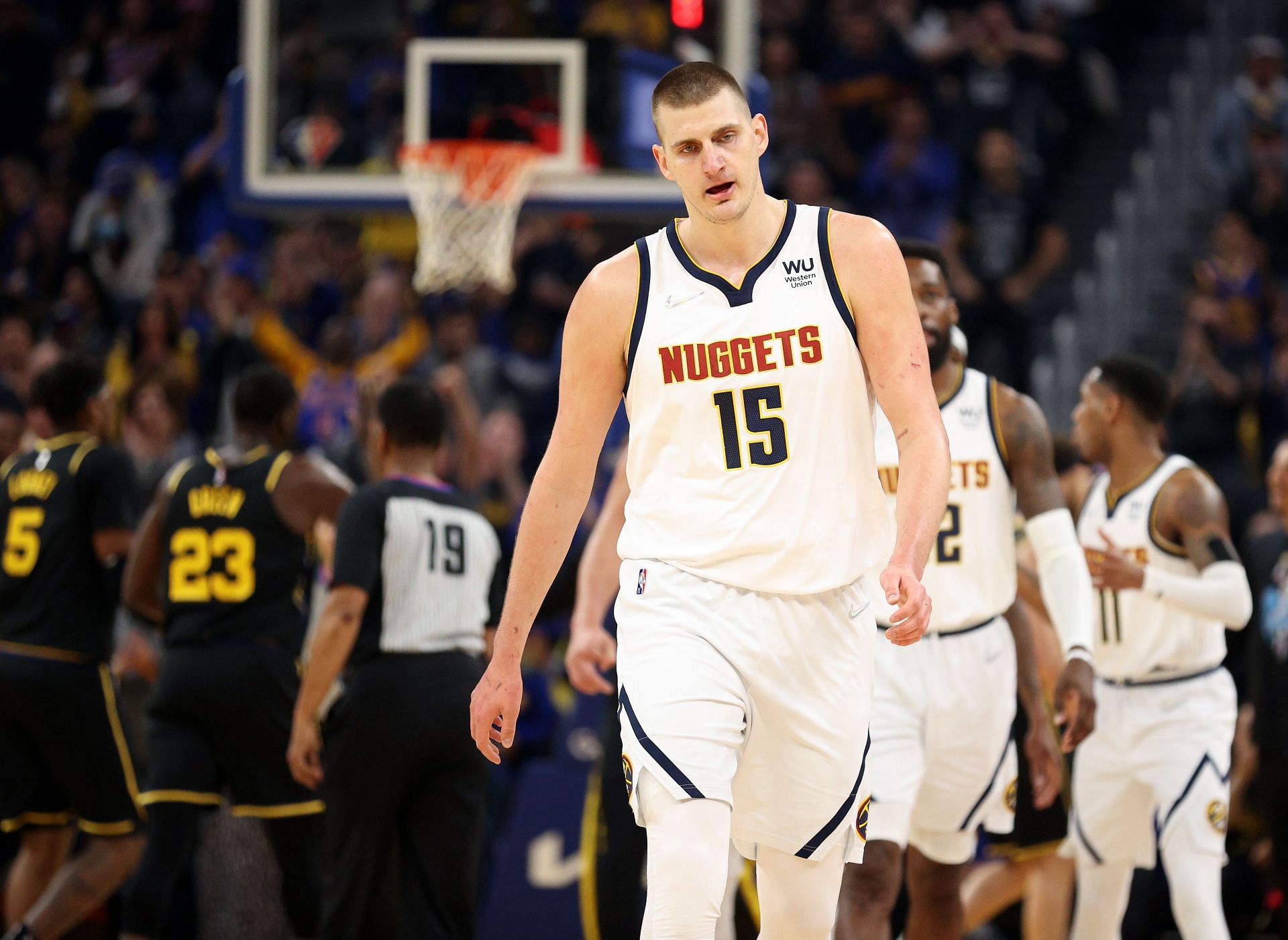 Nikola Jokic walks back to the bench during Game 5 against the Golden State Warriors.