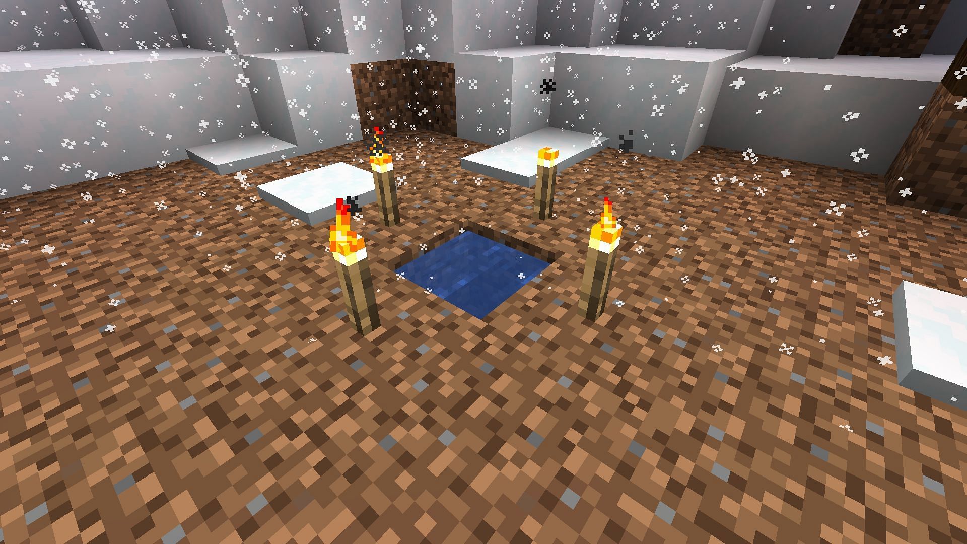 An example of torches keeping water from freezing (Image via Minecraft)