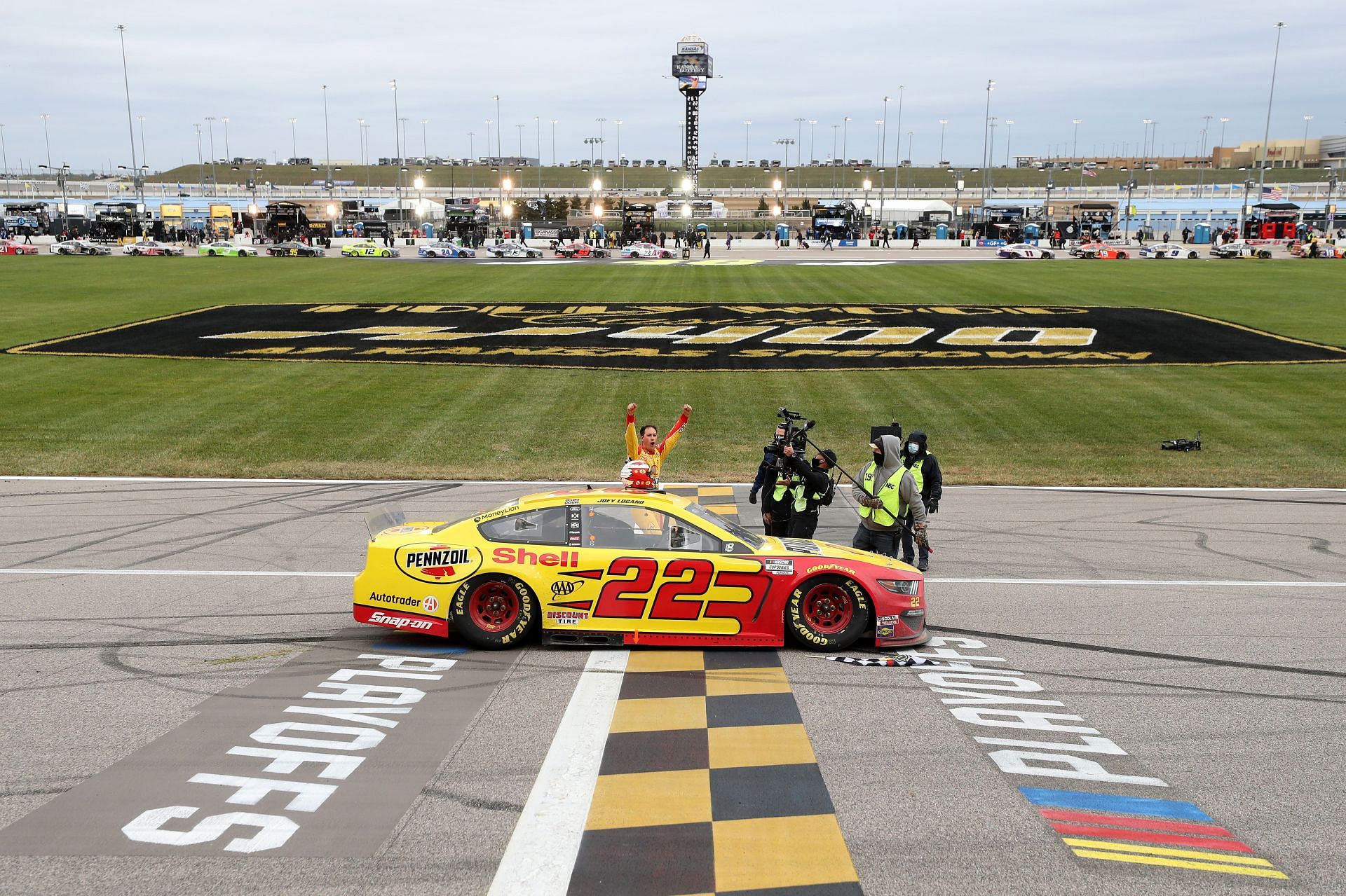 Joey Logano celebrates after winning the 2020 NASCAR Cup Series Hollywood Casino 400 at Kansas Speedway in Kansas City, Kansas (Photo by Jamie Squire/Getty Images)