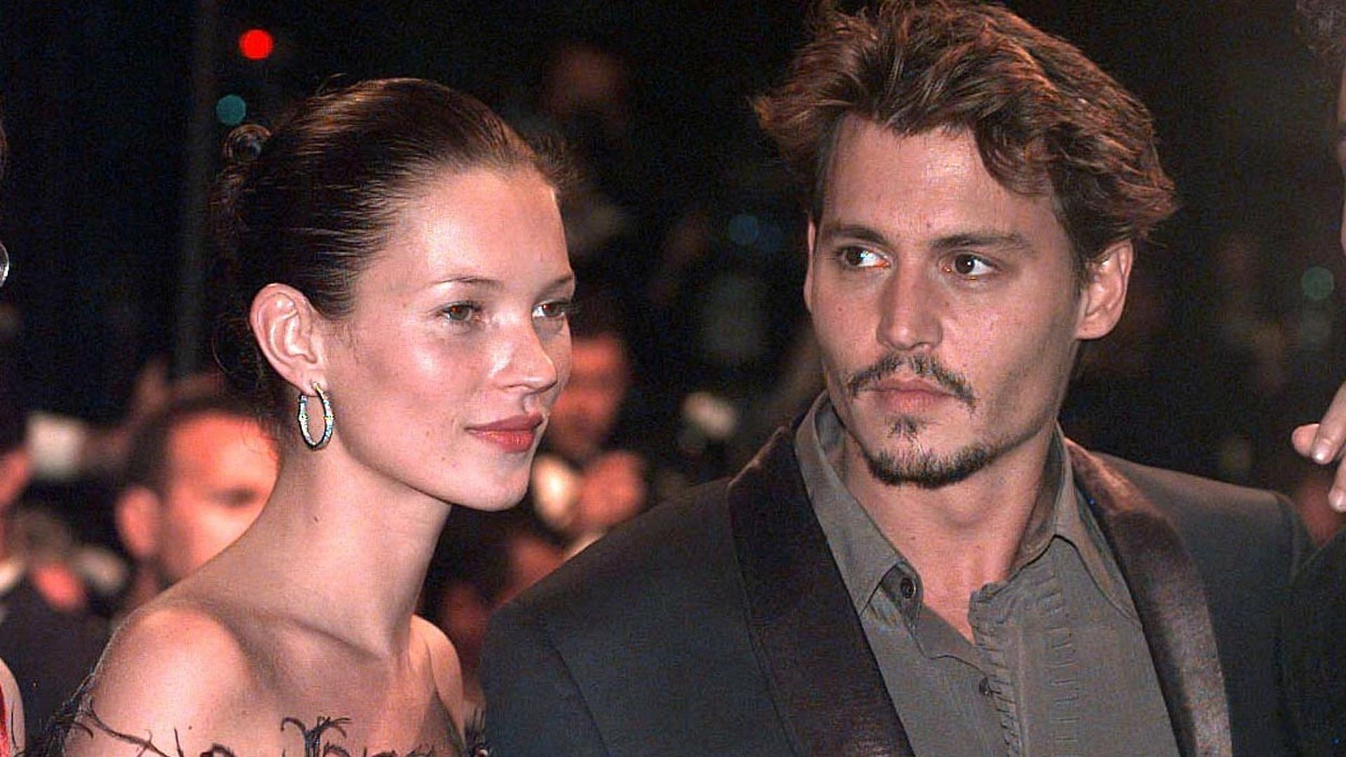 Kate Moss and Johnny Depp during their relationship (Image via PA Images/Getty Images)