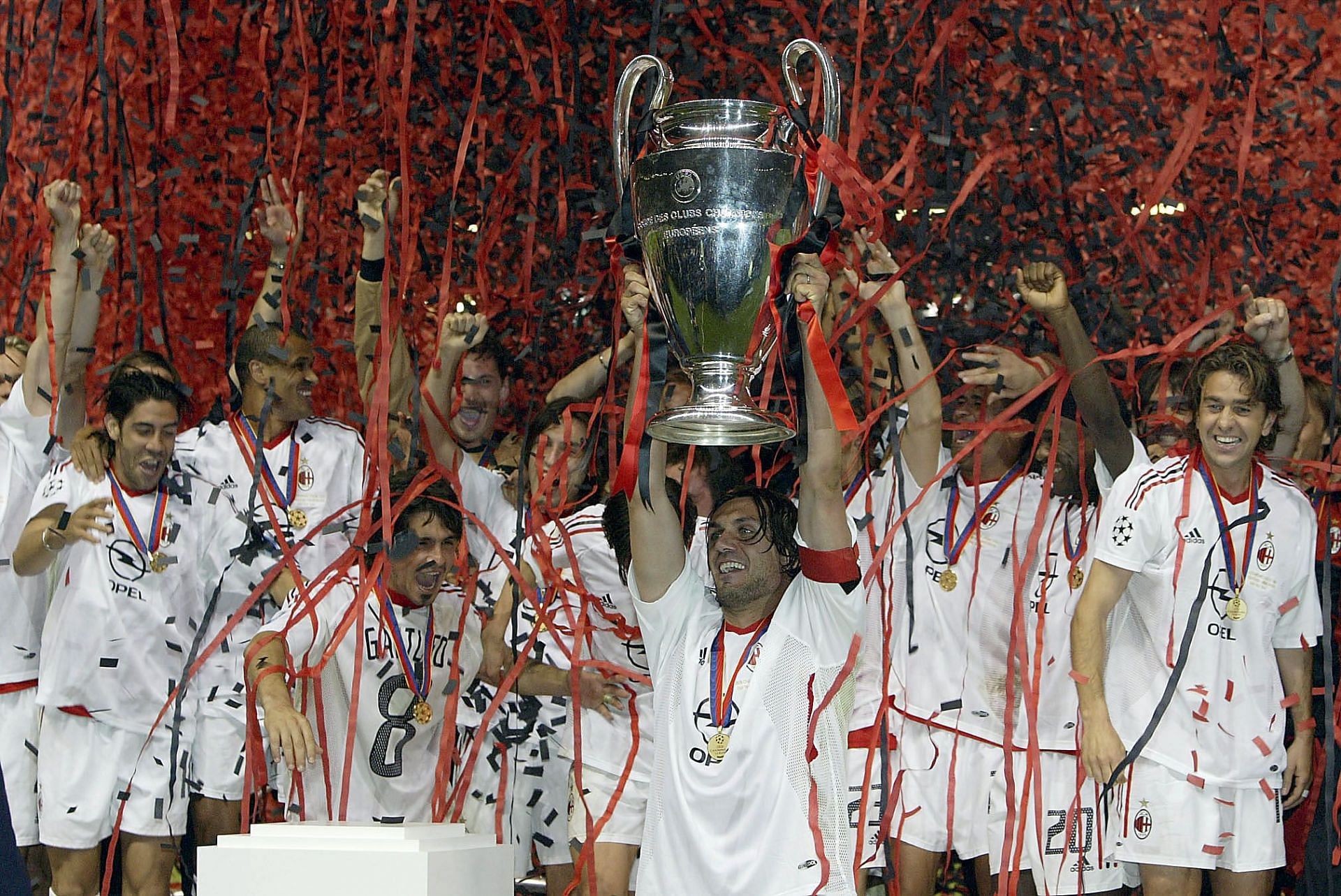 Captain Paolo Maldini of AC Milan lifts the trophy