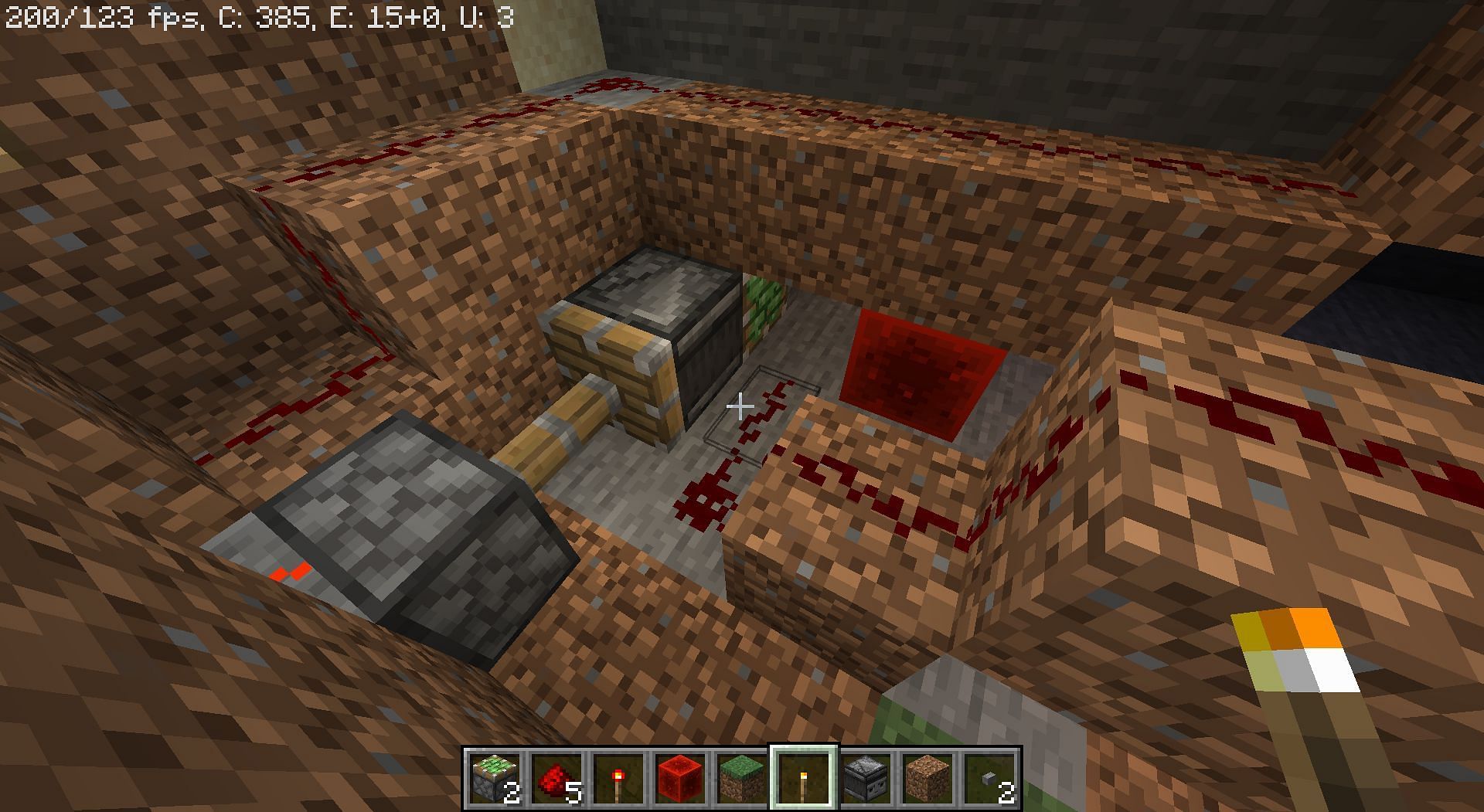 The key room with redstone torch outside (Image via Minecraft)