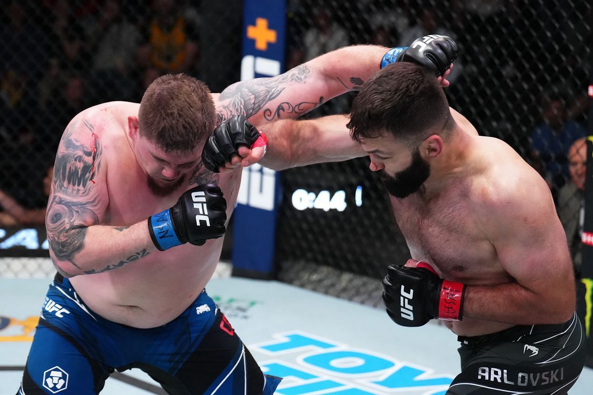 Andrei Arlovski outpointed Jake Collier in a close fight, tying a UFC record in the process