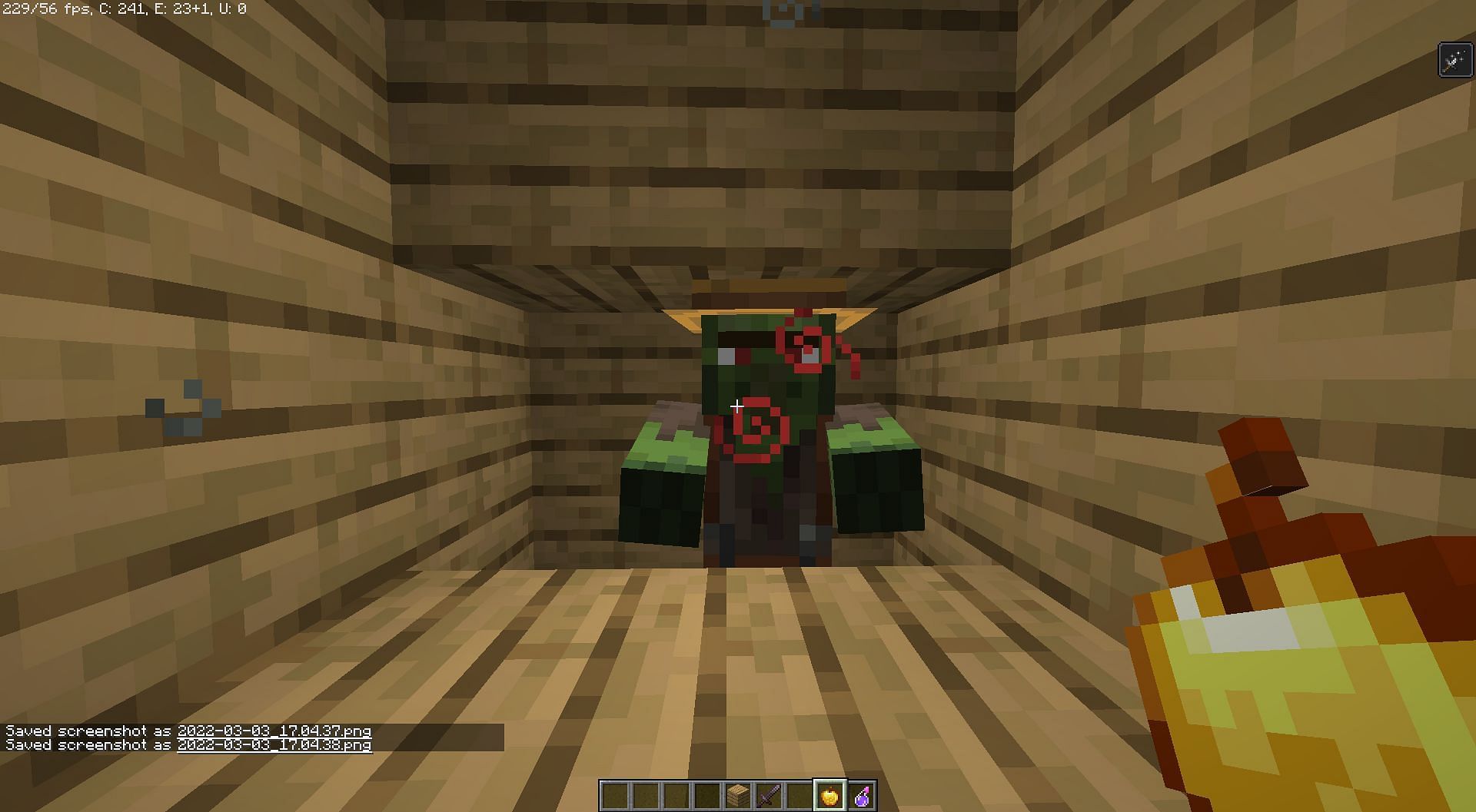 A zombified villager getting cured with potion of weakness and a golden apple (Image via Minecraft)