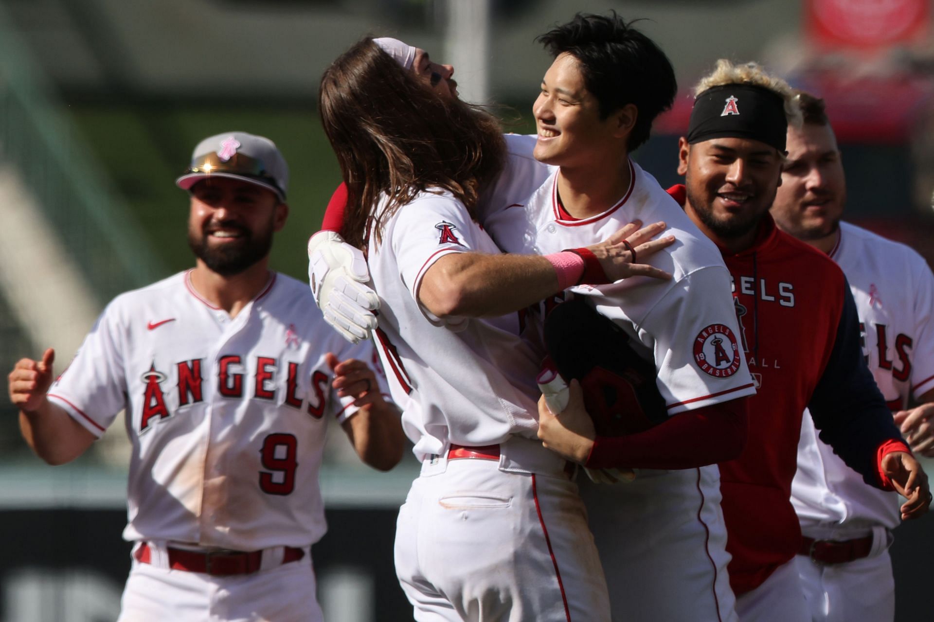Brandon Marsh and Shohei Ohtani of the Los Angeles Angels celebrate the walk-off victory.