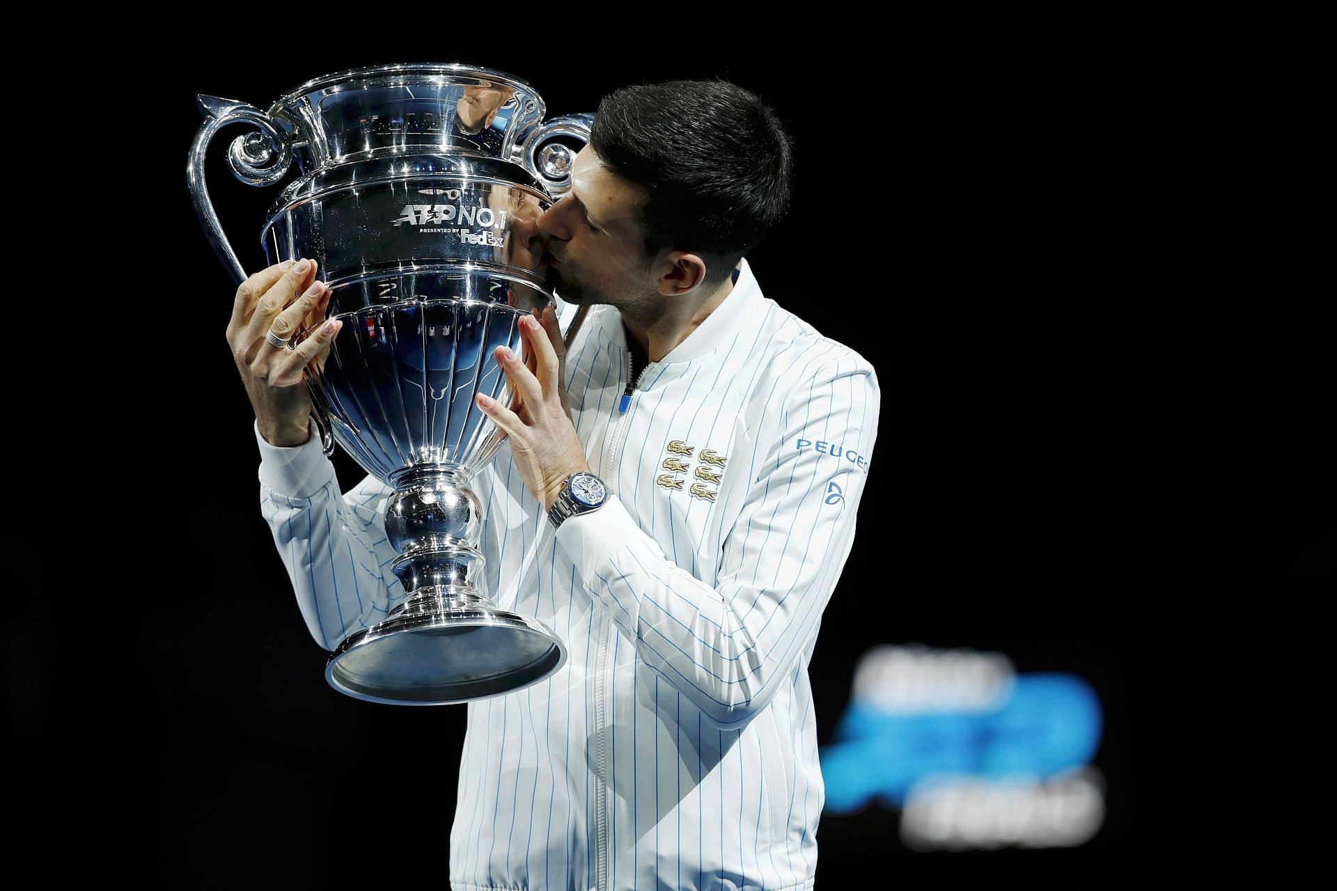 Novak Djokovic with the ATP year-end No. 1 trophy at the 2020 ATP Finals