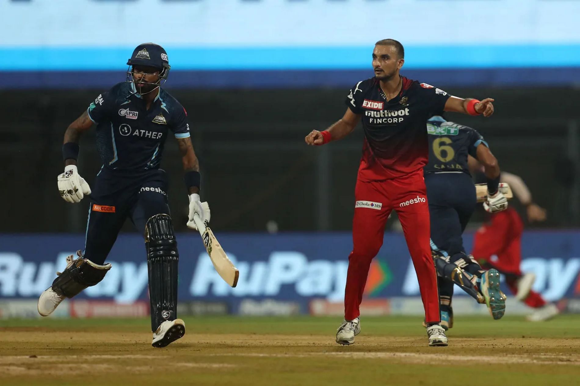 Harshal Patel (right) during the match against GT. Pic: IPLT20.COM