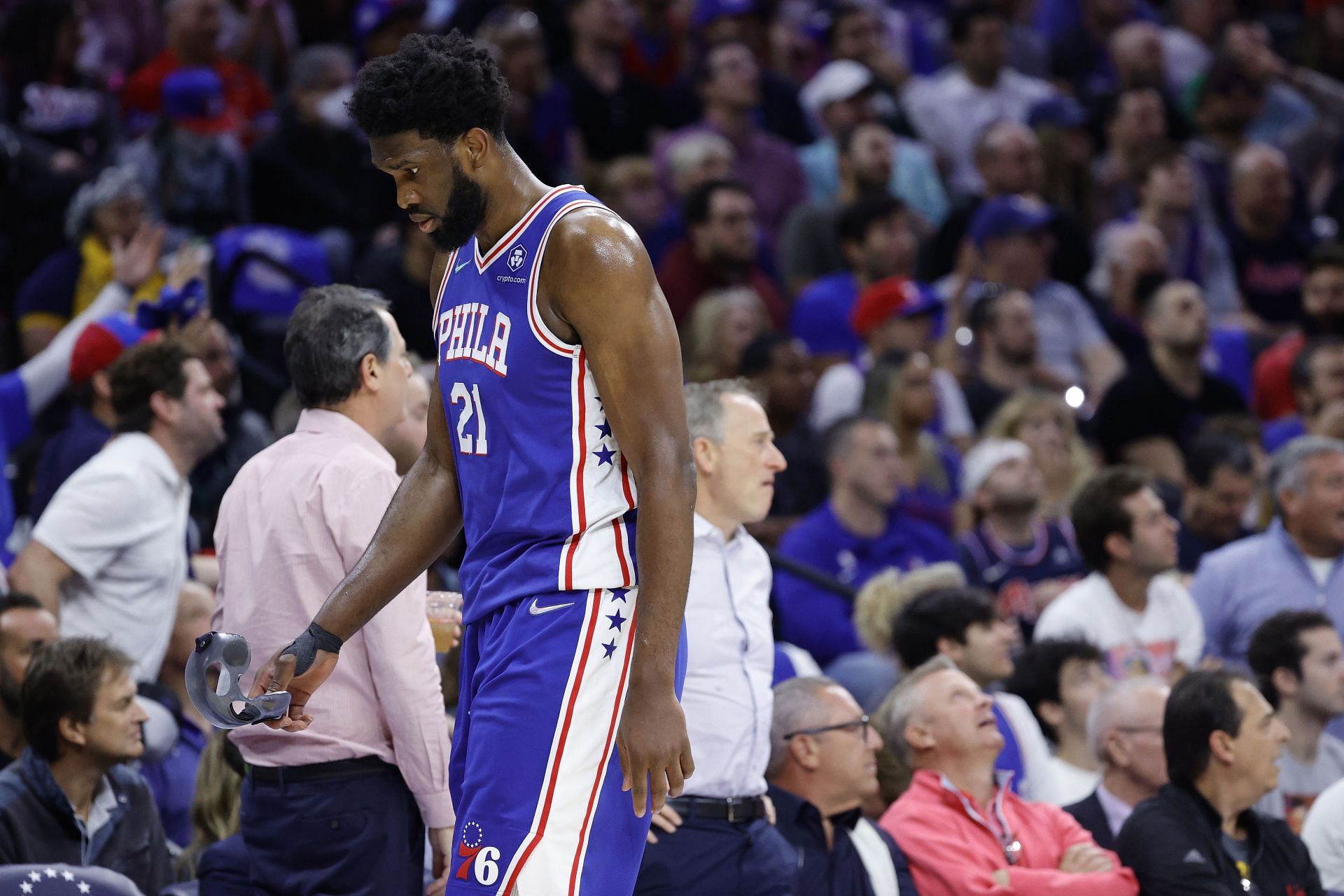Joel Embiid walks off the court during Game 6 against the Miami Heat