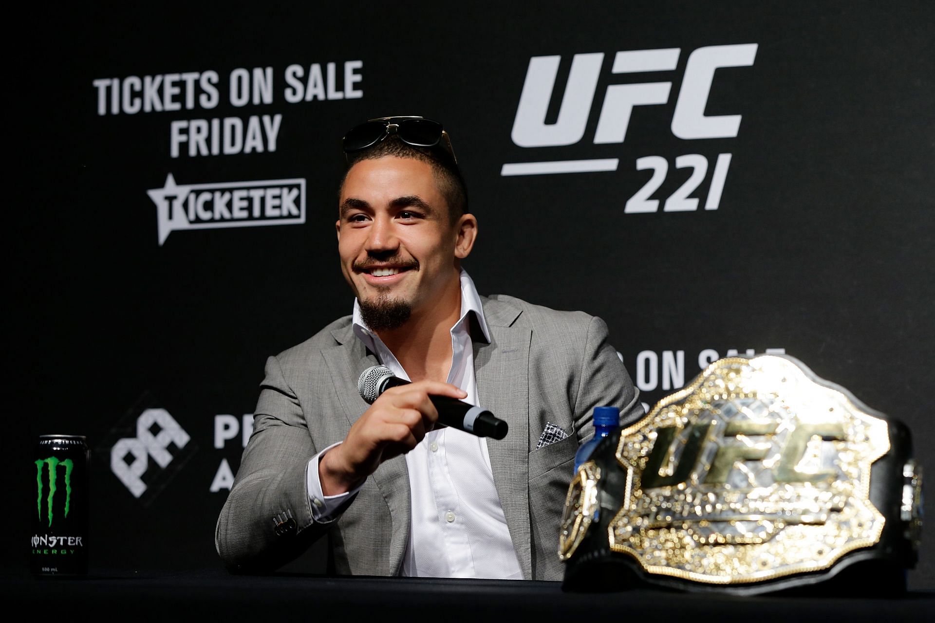 Robert Whittaker with his middleweight title