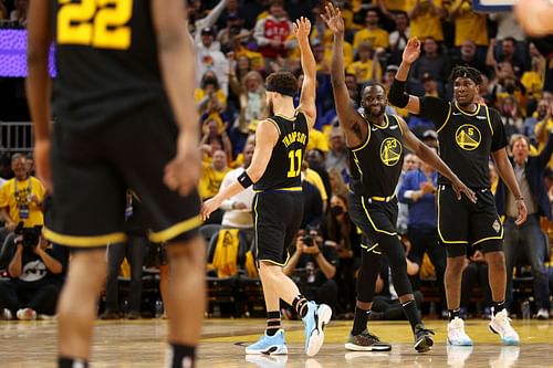 Draymond Green, Klay Thompson celebrate a bucket during the Dallas Mavericks v Golden State Warriors - Game Five