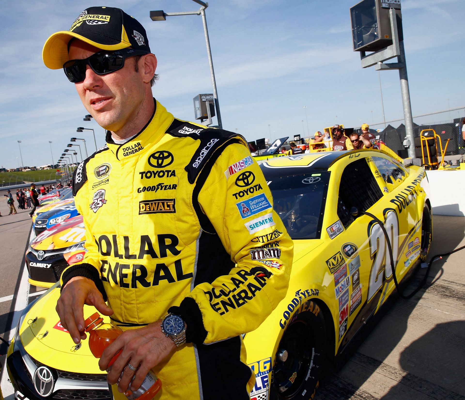 Matt Kenseth stands on the grid during qualifying for the NASCAR Sprint Cup Series Go Bowling 400 at Kansas Speedway (Photo by Jamie Squire/Getty Images)