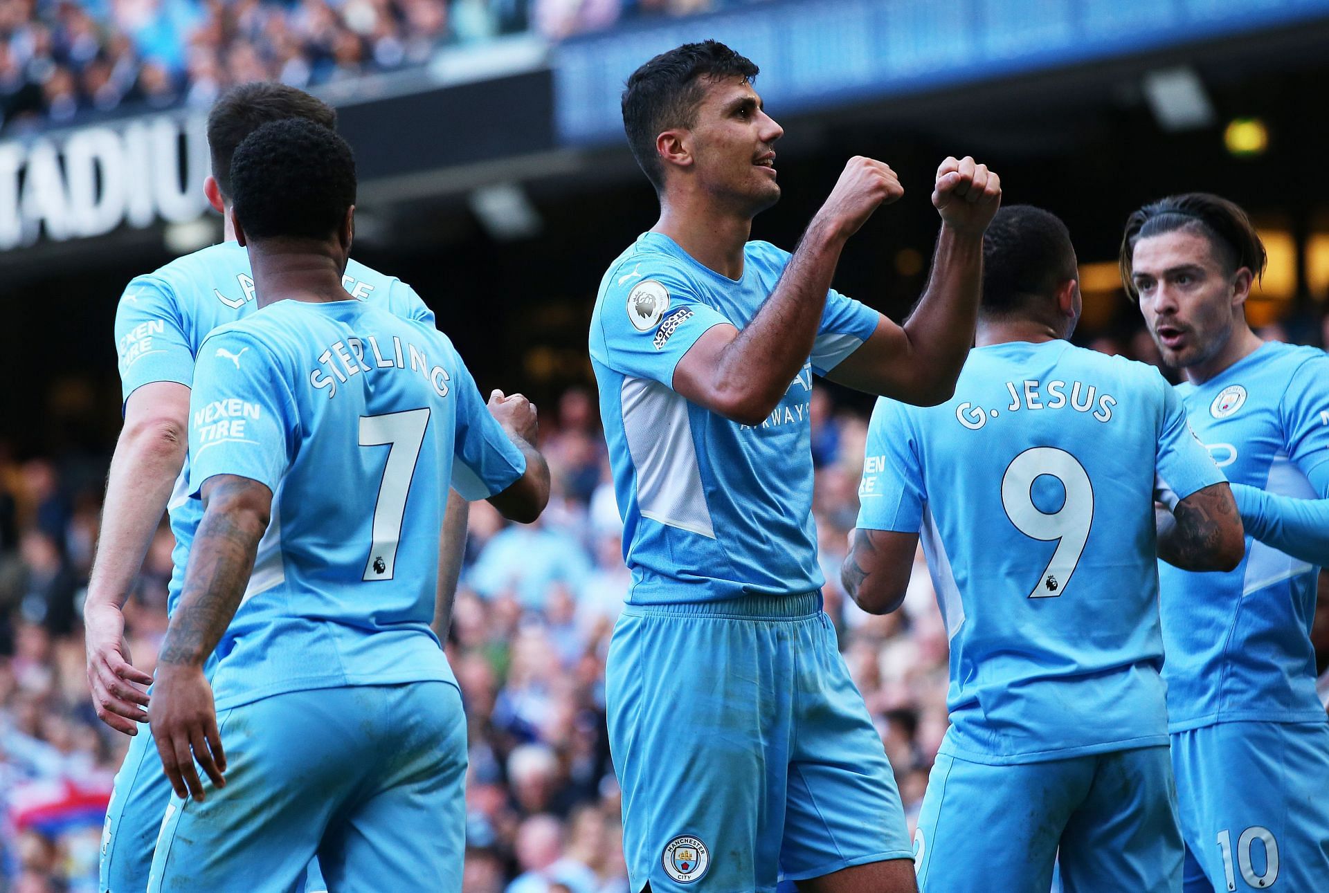 Manchester City celebrate at the Etihad on Sunday