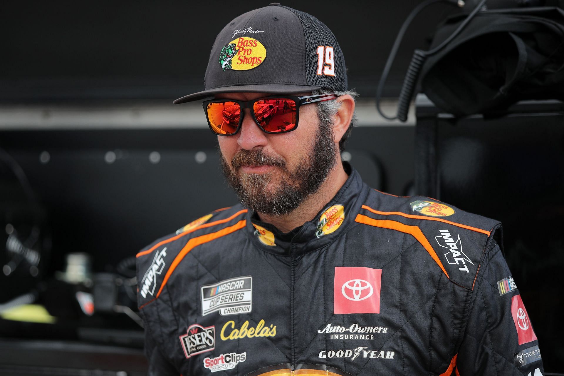 Martin Truex Jr. waits on the grid during practice for the NASCAR Cup Series Blue-Emu Maximum Pain Relief 400 at Martinsville Speedway.