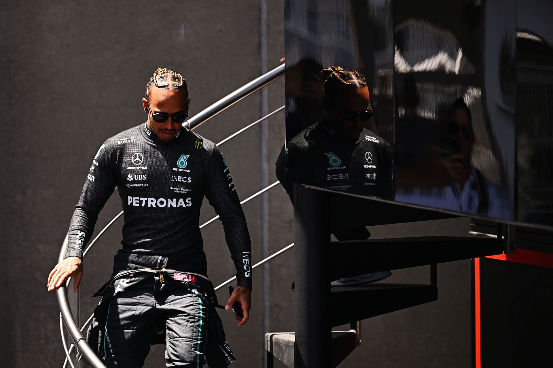 Lewis Hamilton walks in the Paddock during practice ahead of the F1 Grand Prix of Spain at Circuit de Barcelona-Catalunya on May 21, 2022 in Barcelona, Spain. (Photo by Clive Mason/Getty Images)