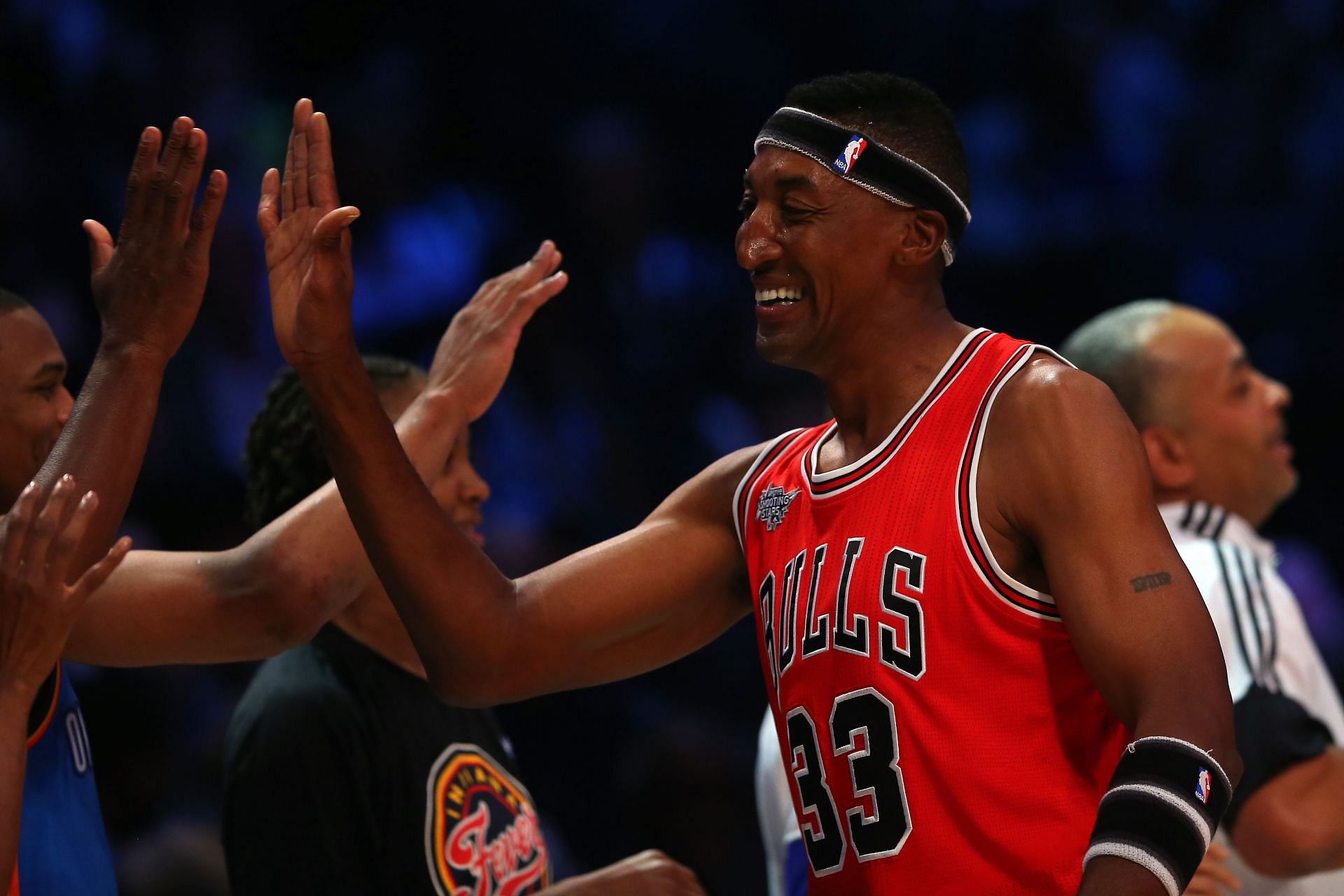 NBA Legend Scottie Pippen #33 high-fives during the Degree Shooting Stars Competition as part of the 2015 NBA Allstar Weekend at Barclays Center on February 14, 2015, in the Brooklyn borough of New York City