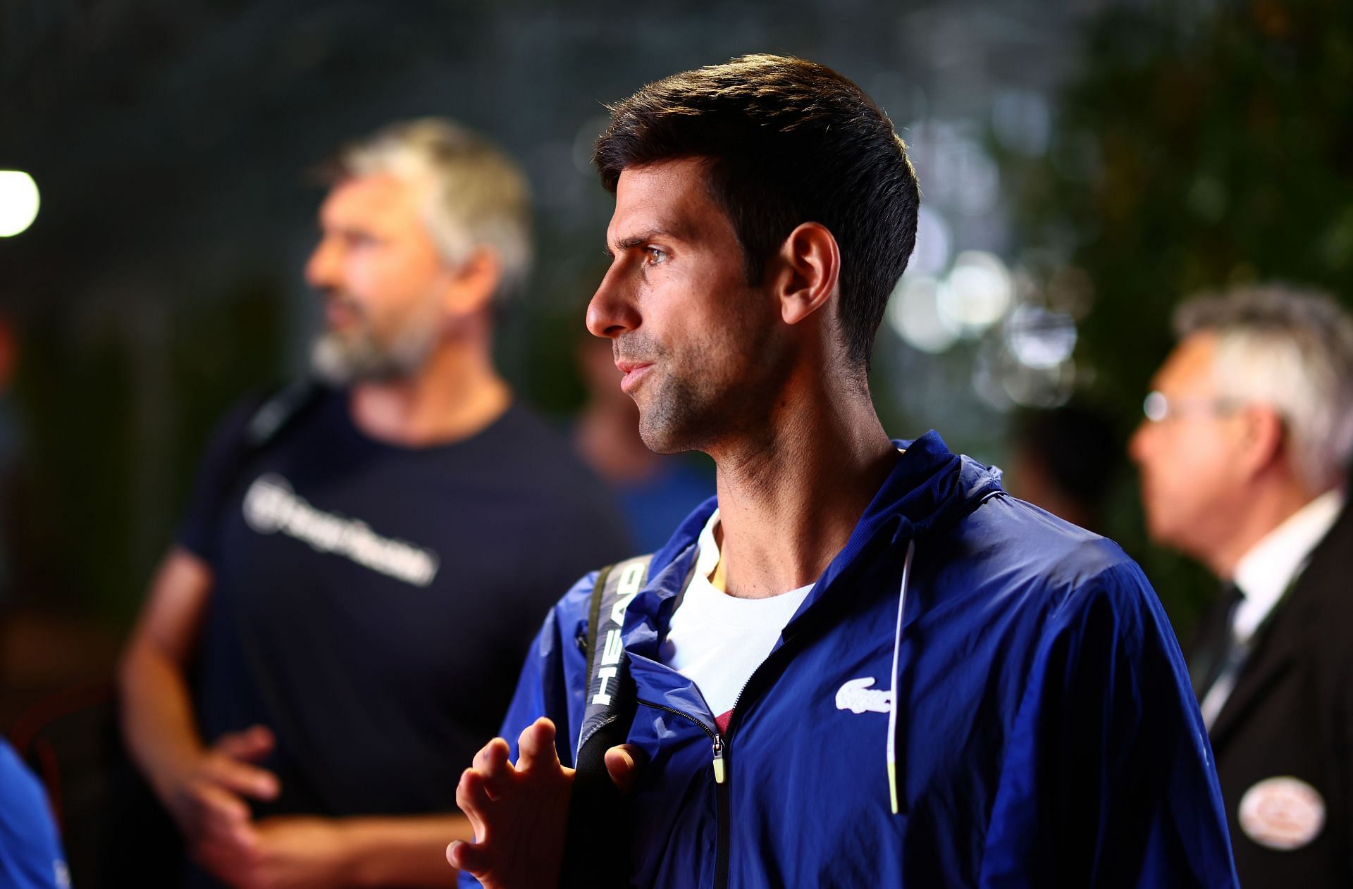 Novak Djokovic waits to go to the court for his practice session at the 2022 Madrid Open