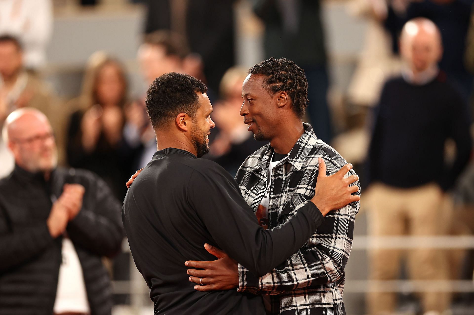 Gael Monfils congratulates Jo-Wilfried Tsonga during the latter&#039;s farewell ceremony at 2022 French Open